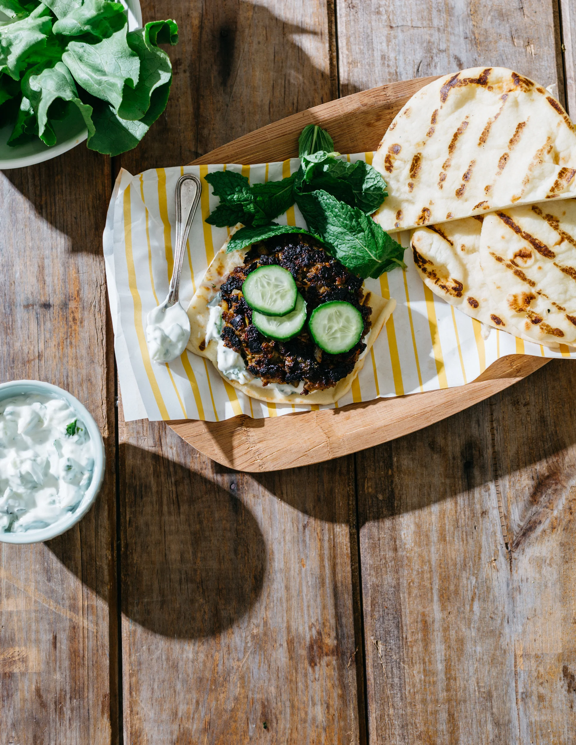 Curried Goat Burgers with Apples, Cucumber-Mint Yogurt and Nigella Seeds