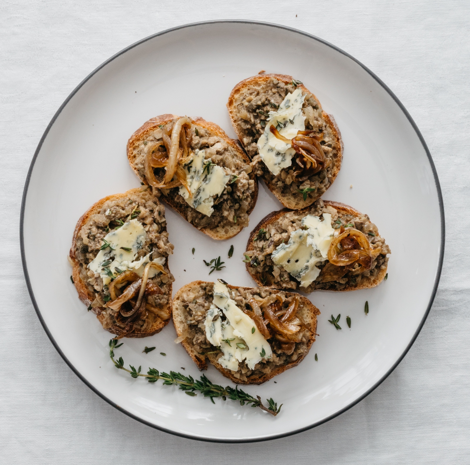 Florentine Chicken Liver Crostini with Vin Santo, Caramelized Onions and Blue Cheese