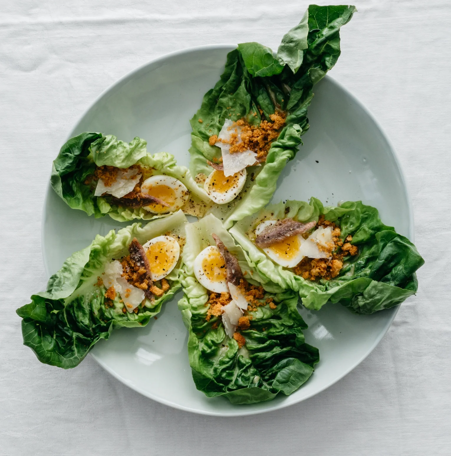 Hand-Held Caesar with Quail Eggs and Crouton Crumbs