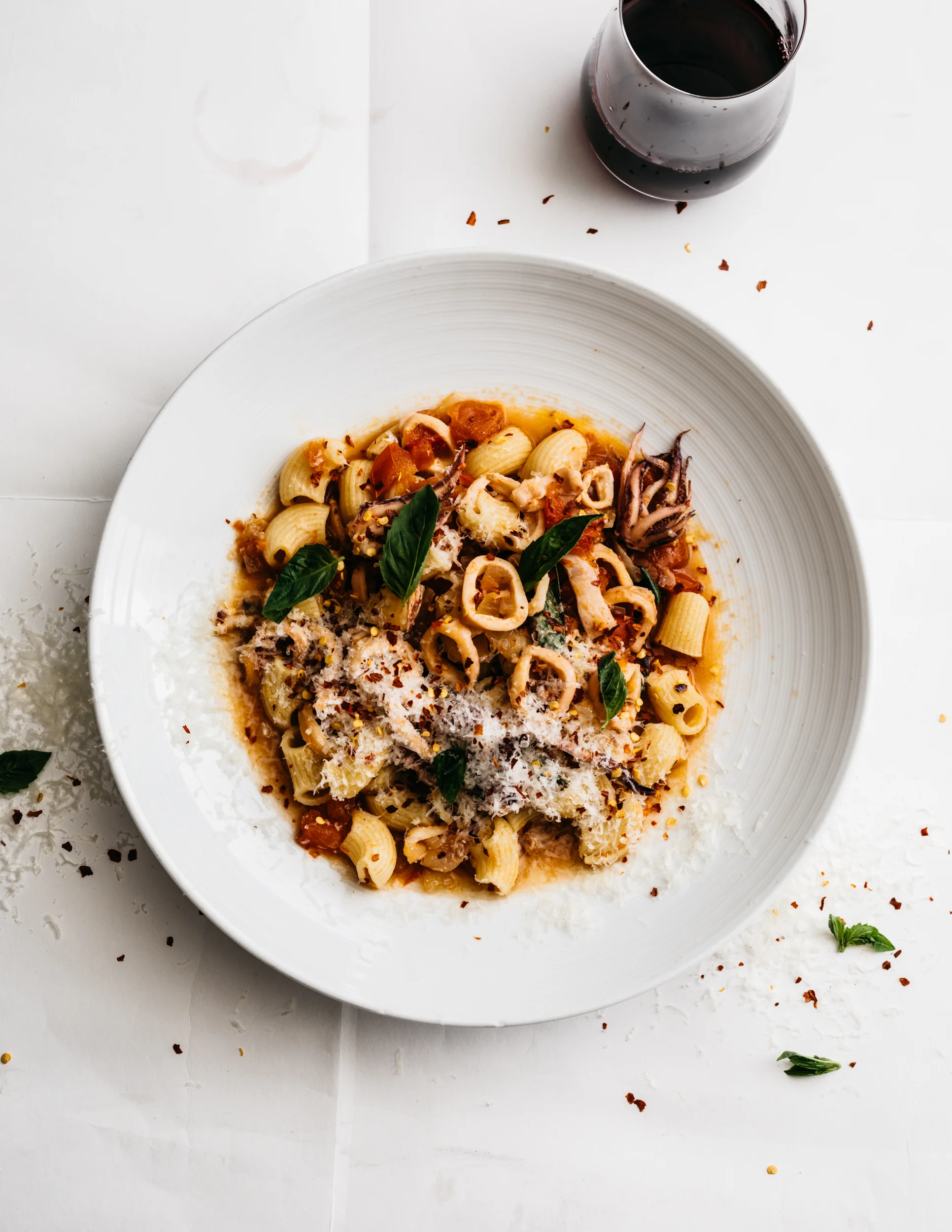 Rigatoni with Braised Squid, Tomatoes, Garlic and Basil