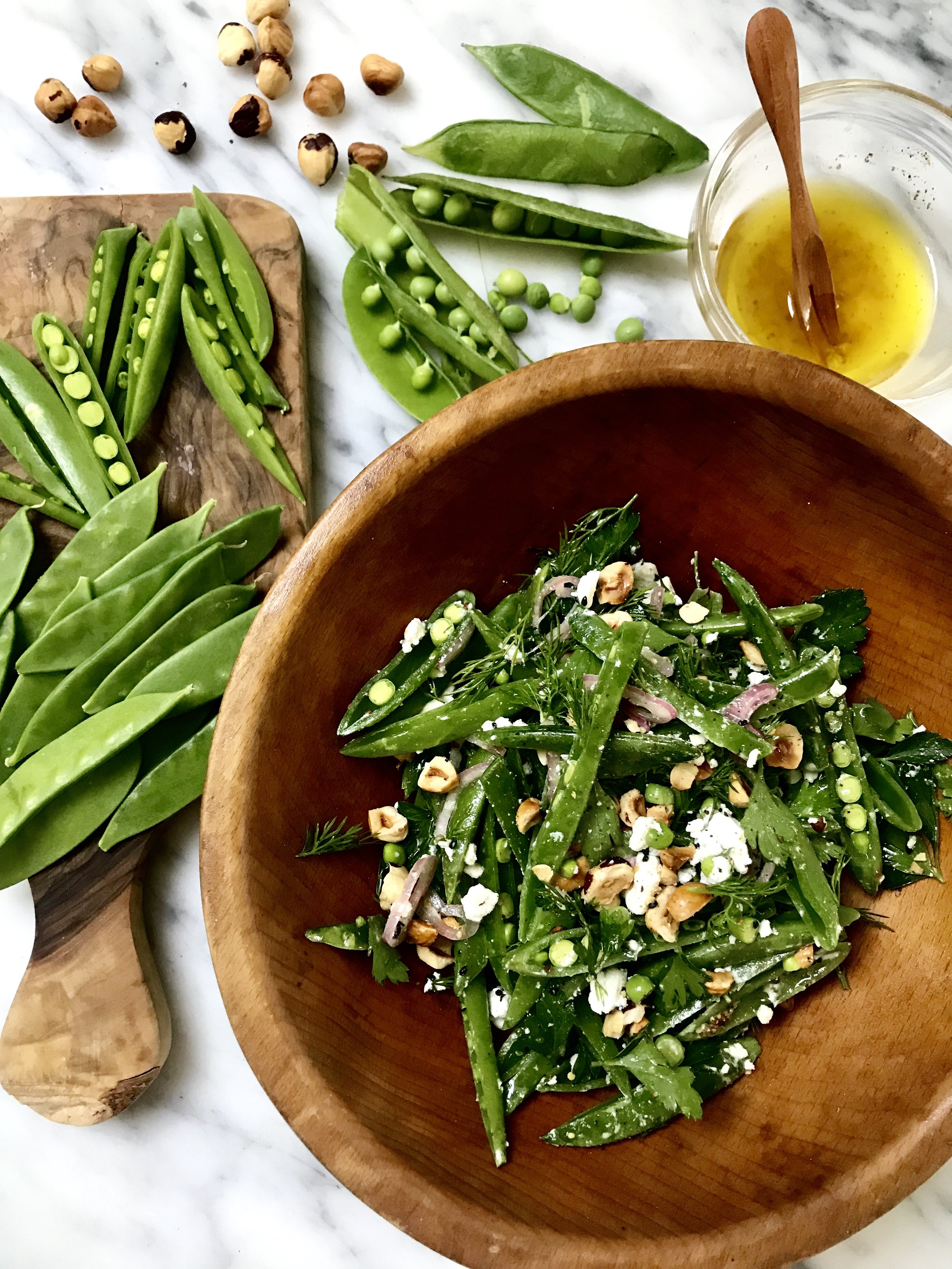 Sugar Snap Pea Salad with Feta, Nigella Seeds, Pickled Shallots and Toasted Hazelnuts