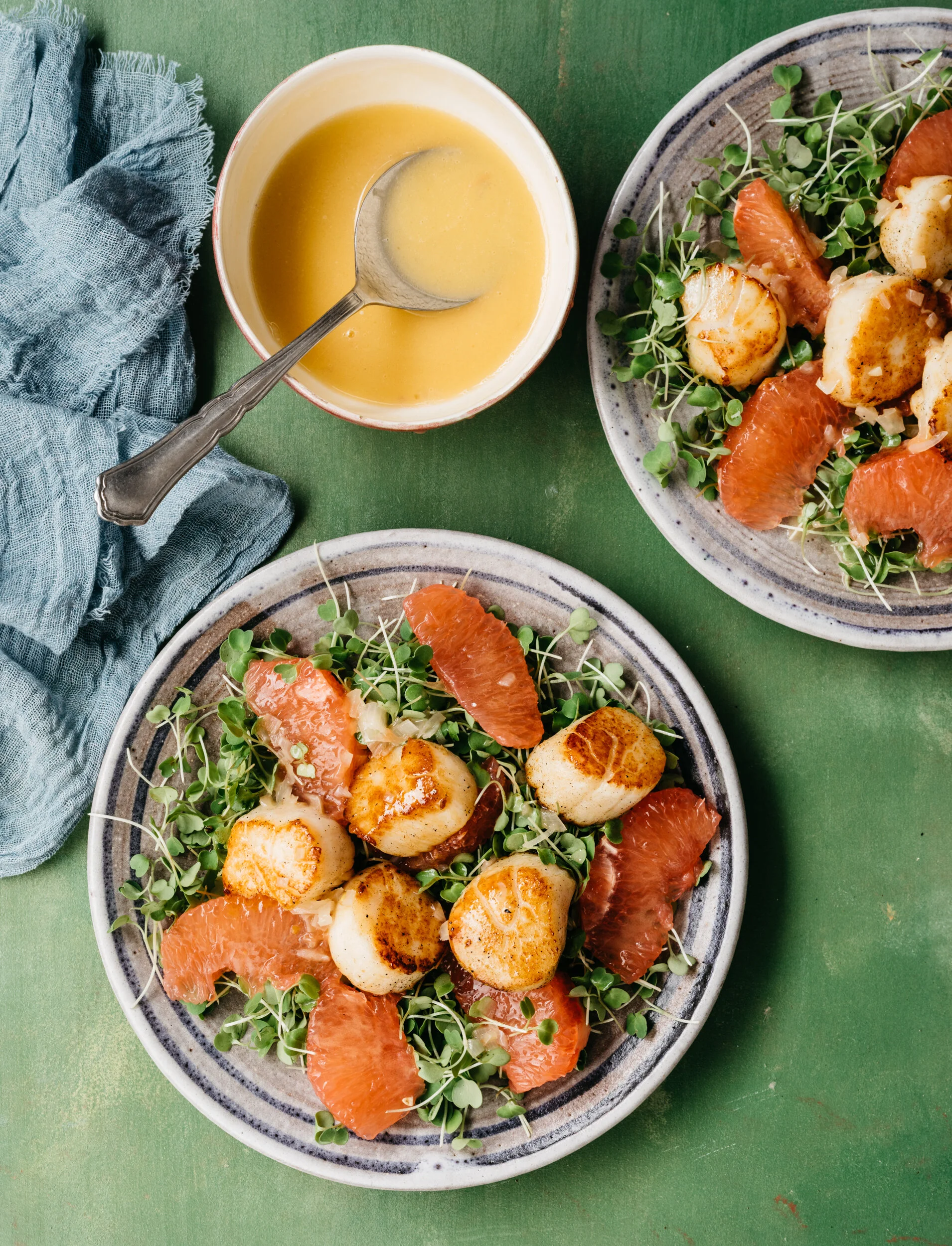 Scallops with Micro Arugula and Warm Grapefruit Sauce