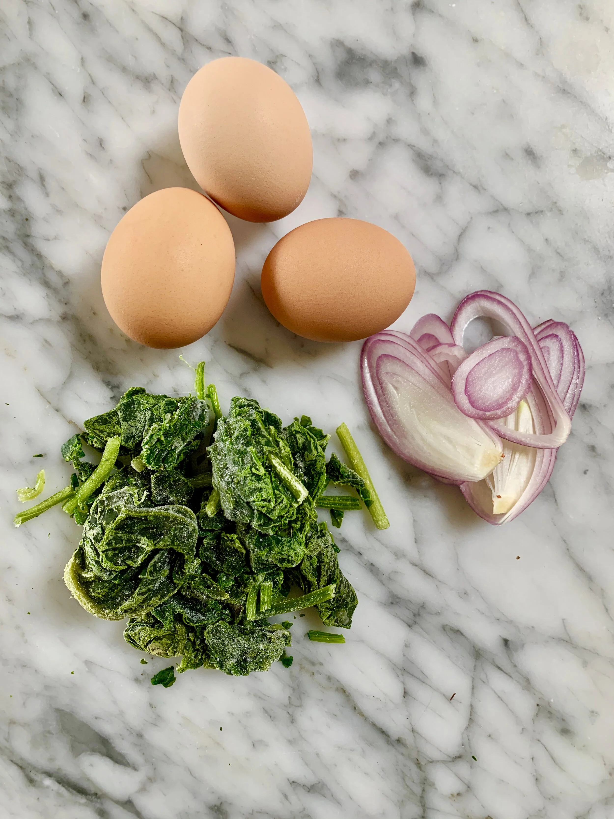 Huevos Haminados con Spinaci (courtesy of Joan Nathan)