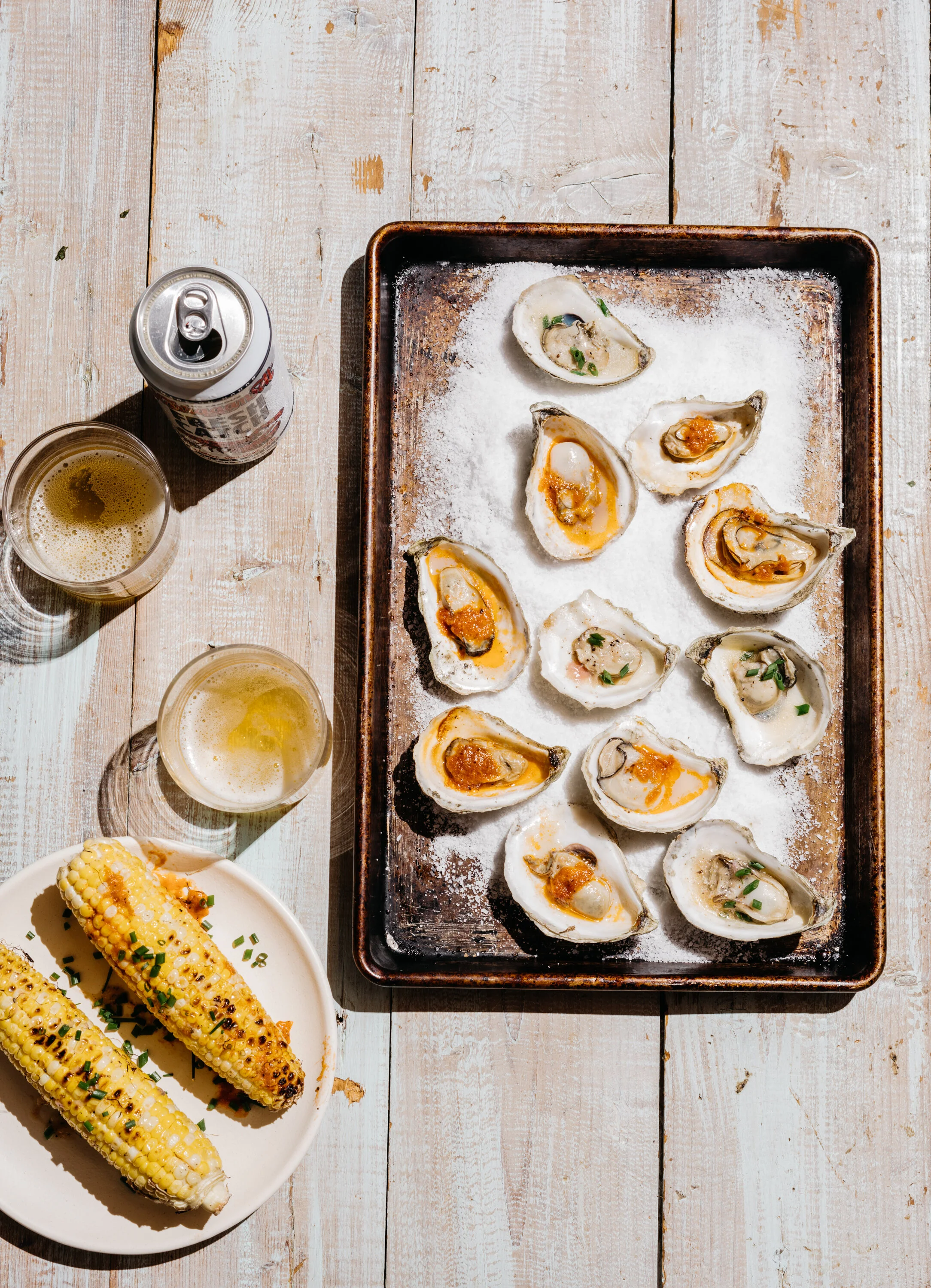 Grilled Oysters with Tomato-Horseradish and Mignonette Butters and Corn on the Cob