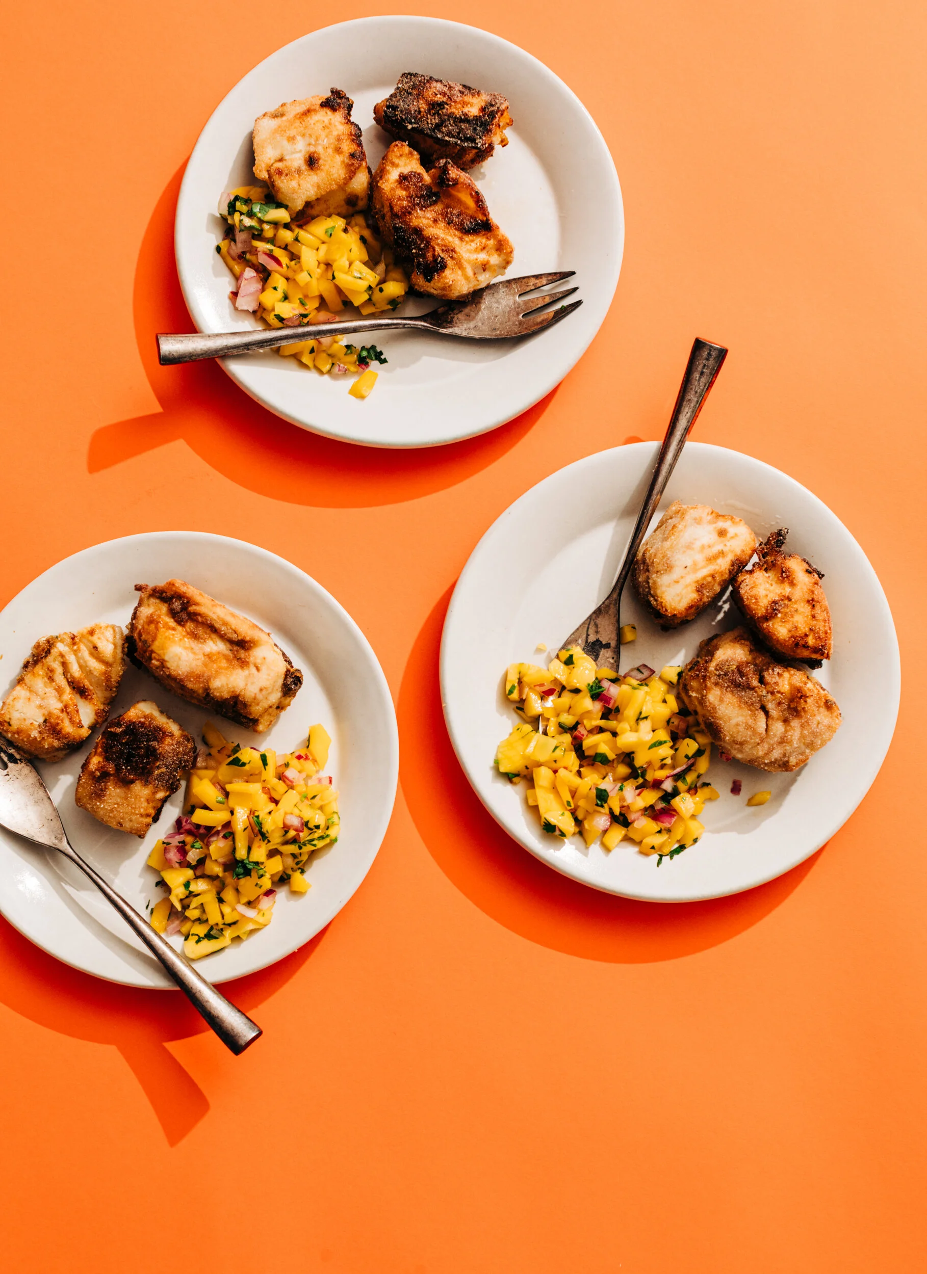 Crispy Marinated Pan-Fried Fish and Mango Slaw