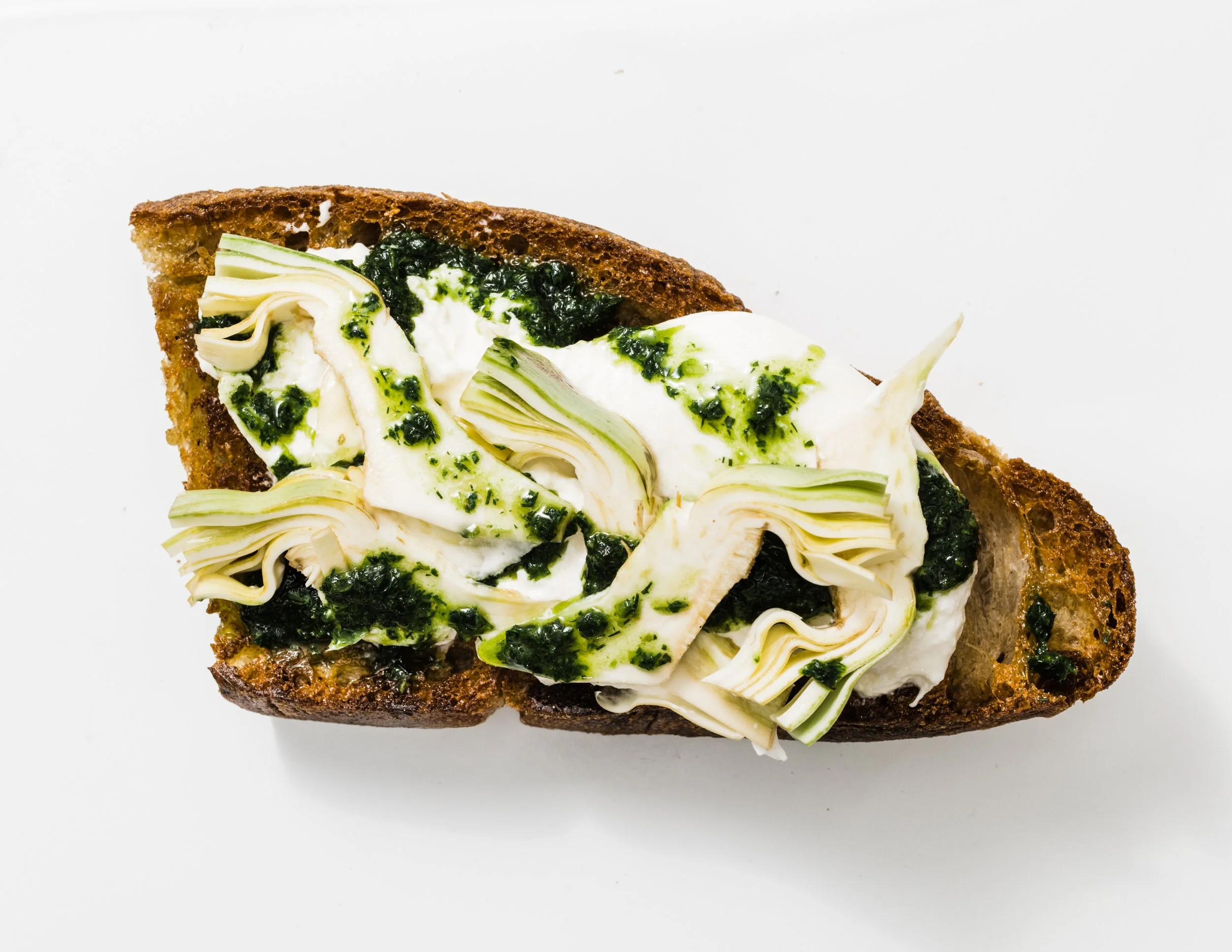 Local Burrata Toast with Spring Herb Pesto and Artichokes