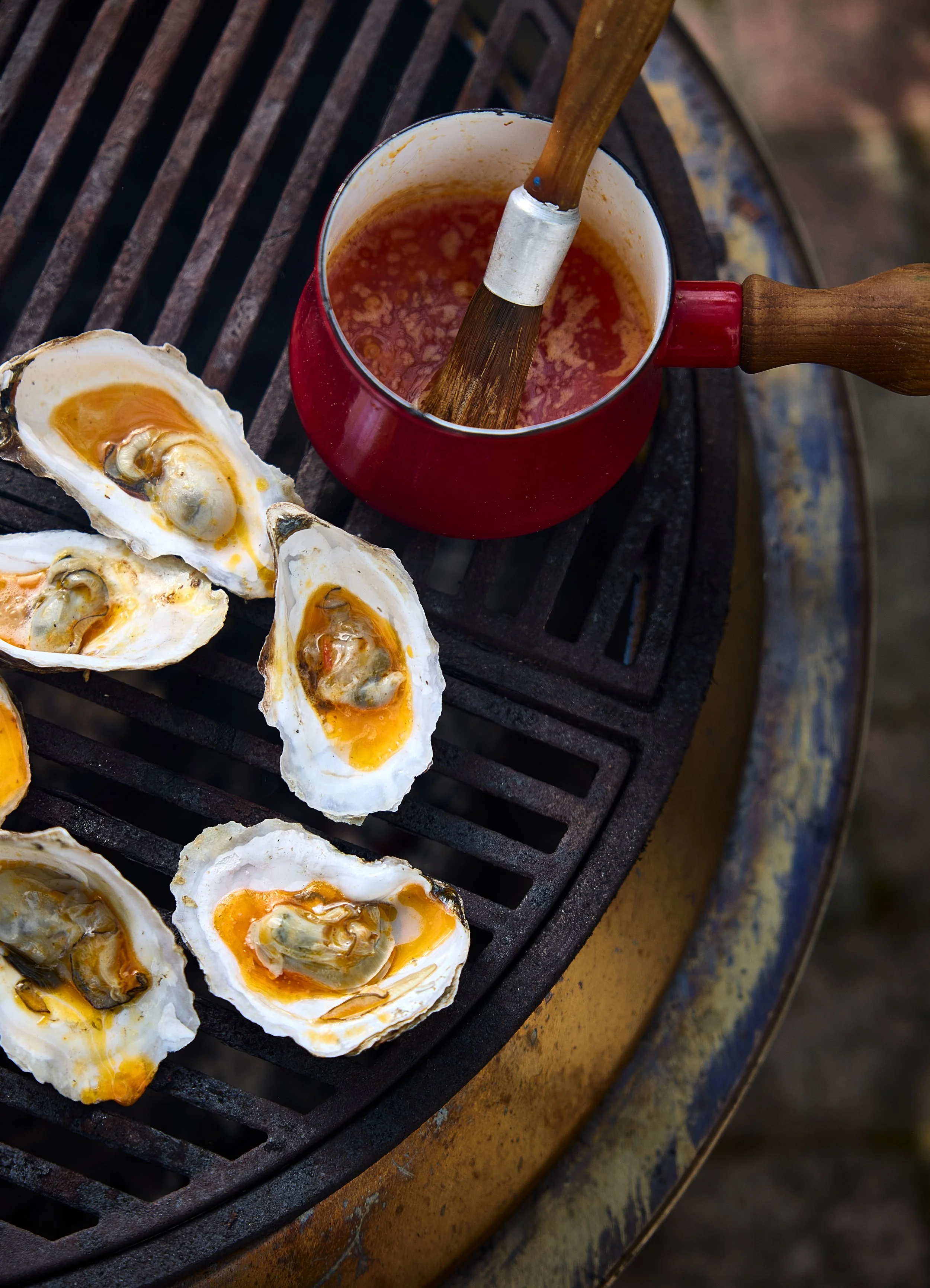 Grilled Oysters with Calabrian Chili Butter