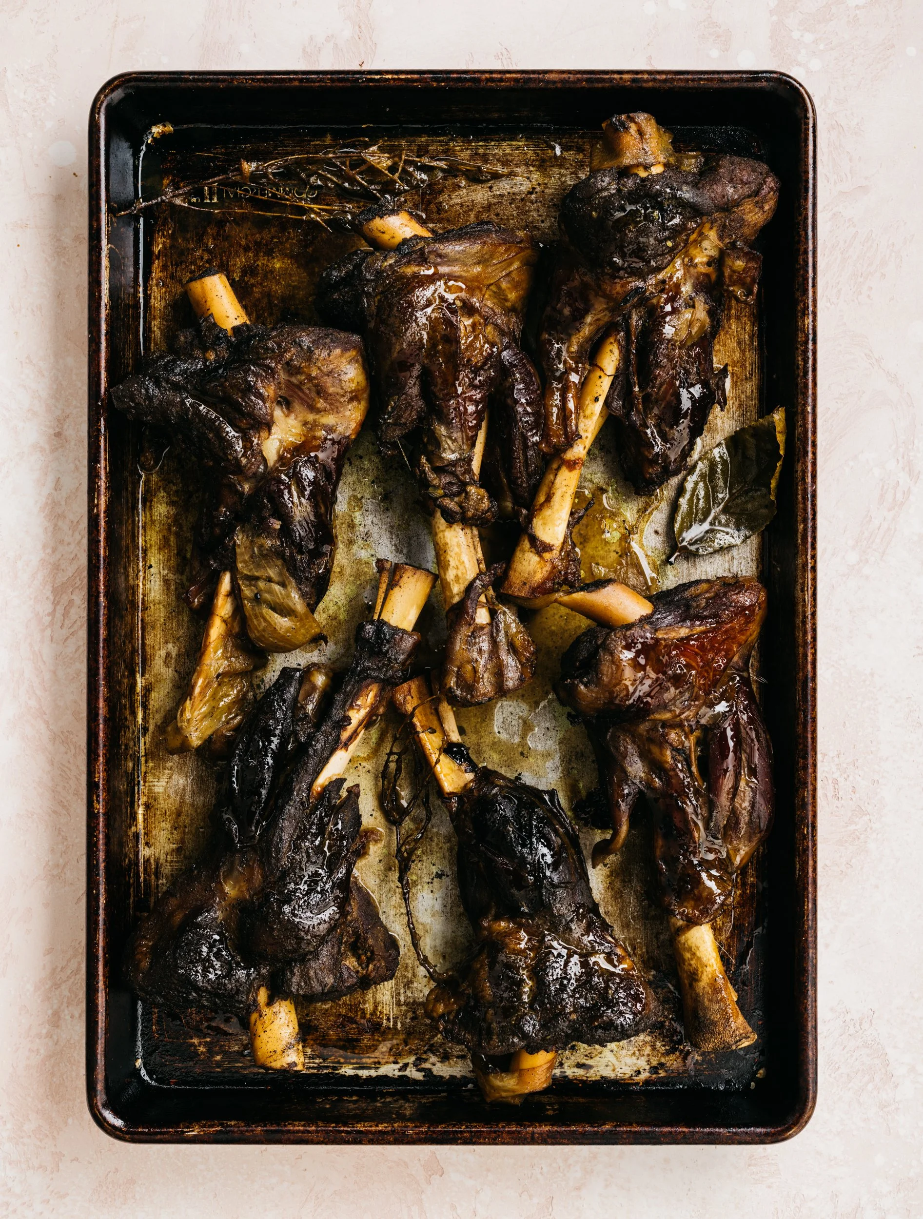 Global Braised Goat Shanks with Smokey Sautéed Kale and Roasted Cassava