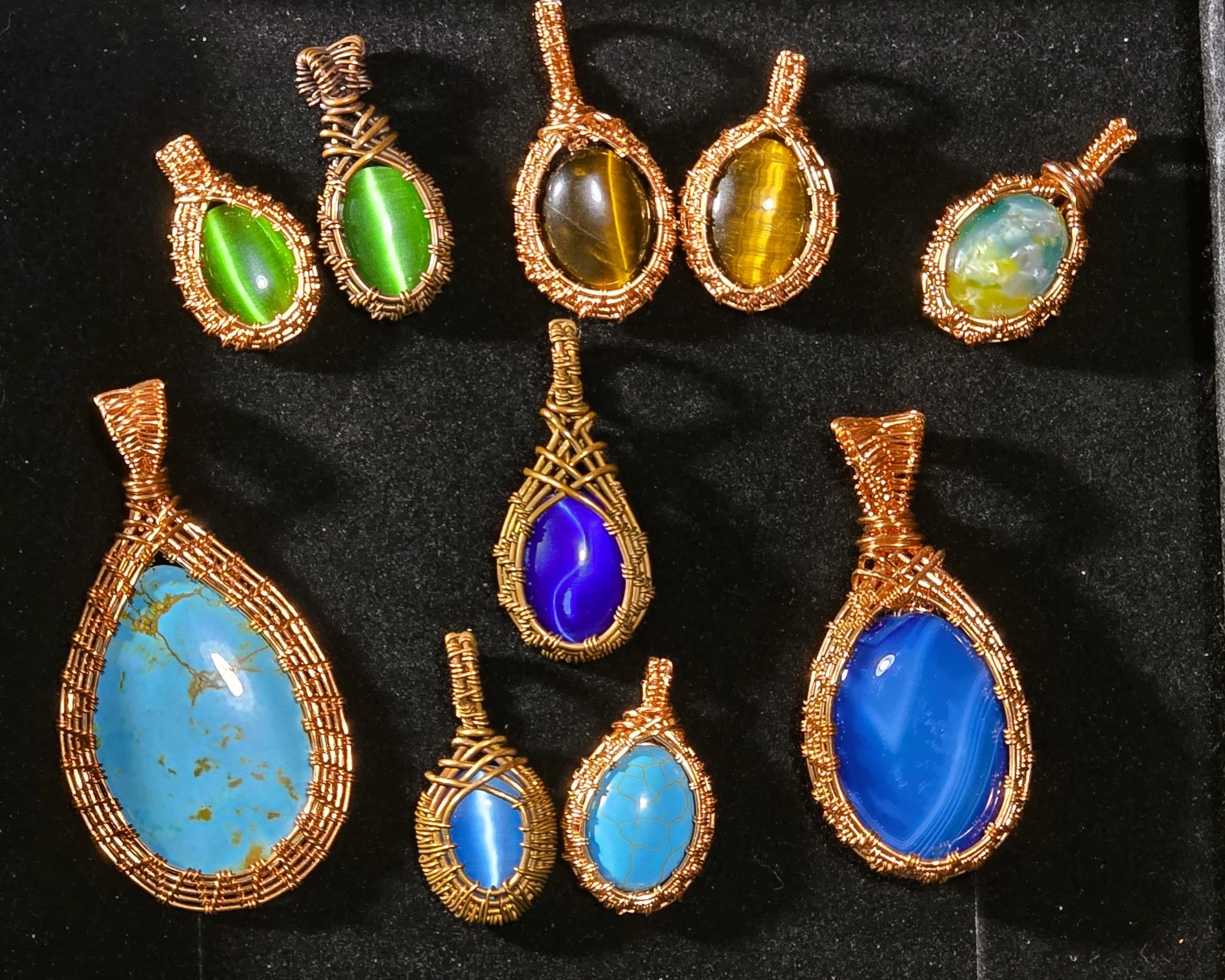 Pendants wire wrapped in copper.jpg