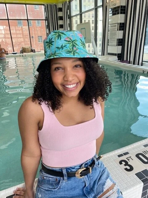 curly hair with bucket hat