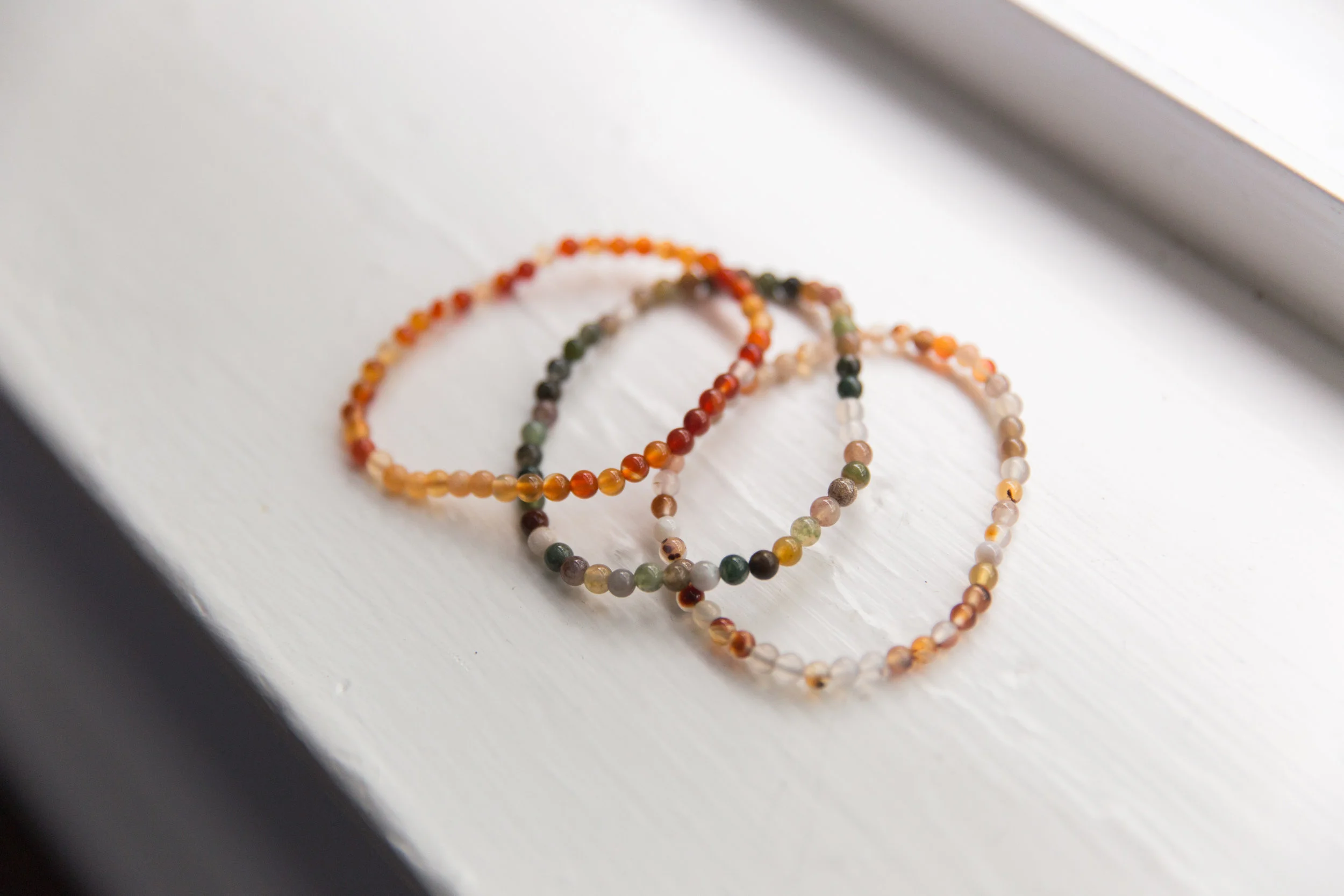 Milk and Honey Bracelets, $8 Beautiful bracelets with healing stones made by local company Milk and Honey .