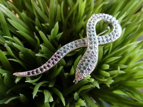 Blue Topaz and Amethyst Sterling Silver Snake Pin. $180