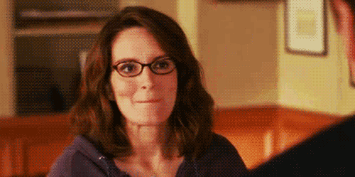 Liz-Lemon-Bites-Her-Tongue-In-Restraint-On-30-Rock.gif