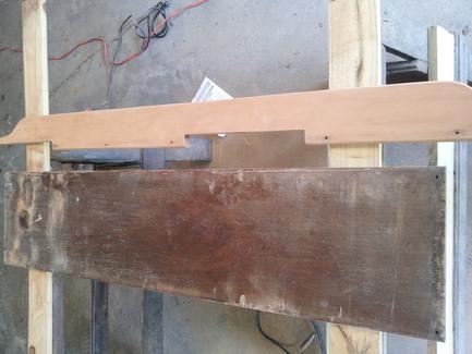 The main bench seat before sanding and the starboard rail all sanded down.