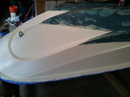 I taped the original water line and the rub rail and, after sanding and fairing I painted two coats of PreKote Primer.