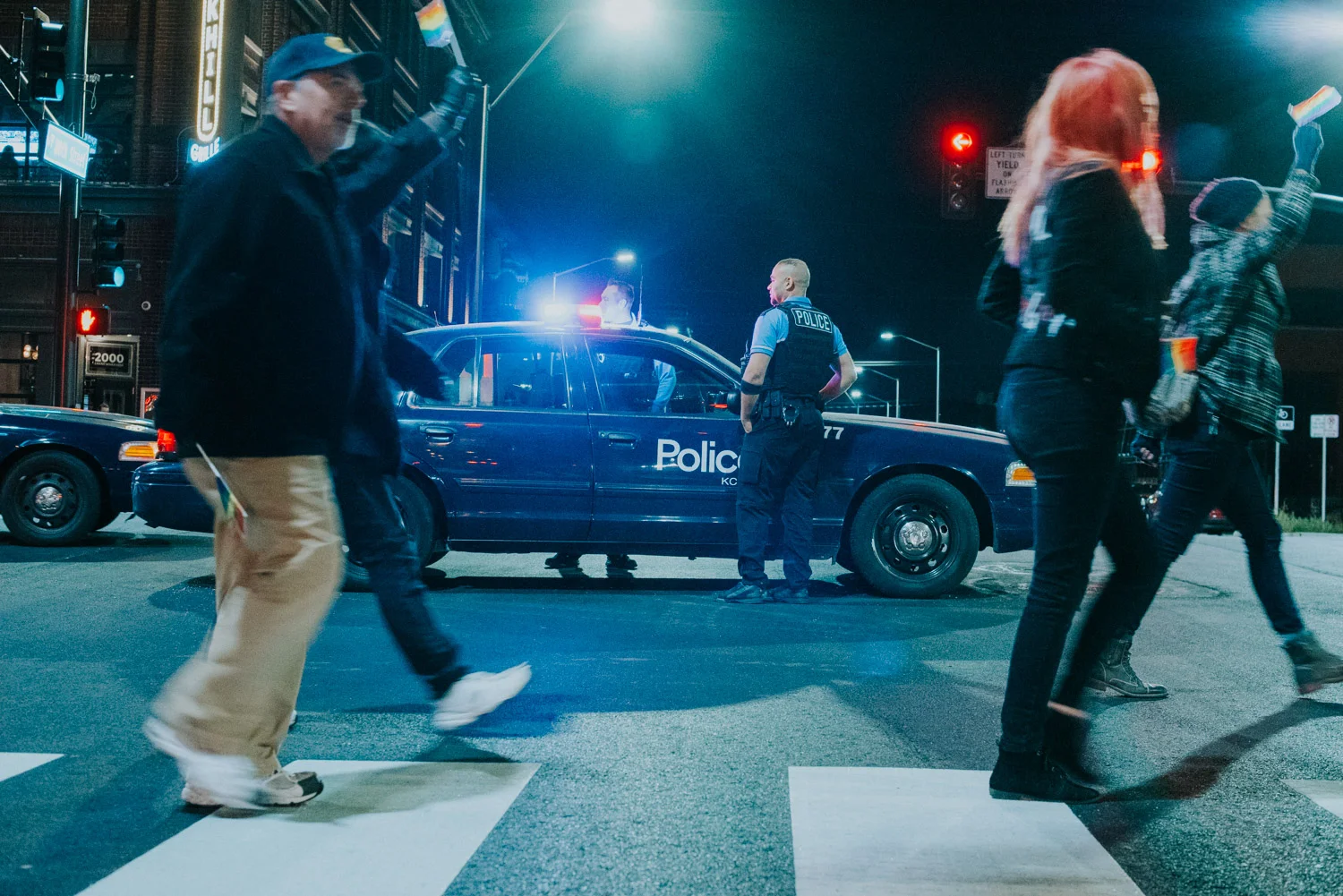  The Kansas City Police Department follows alongside the protest blocking off traffic for safe passage.