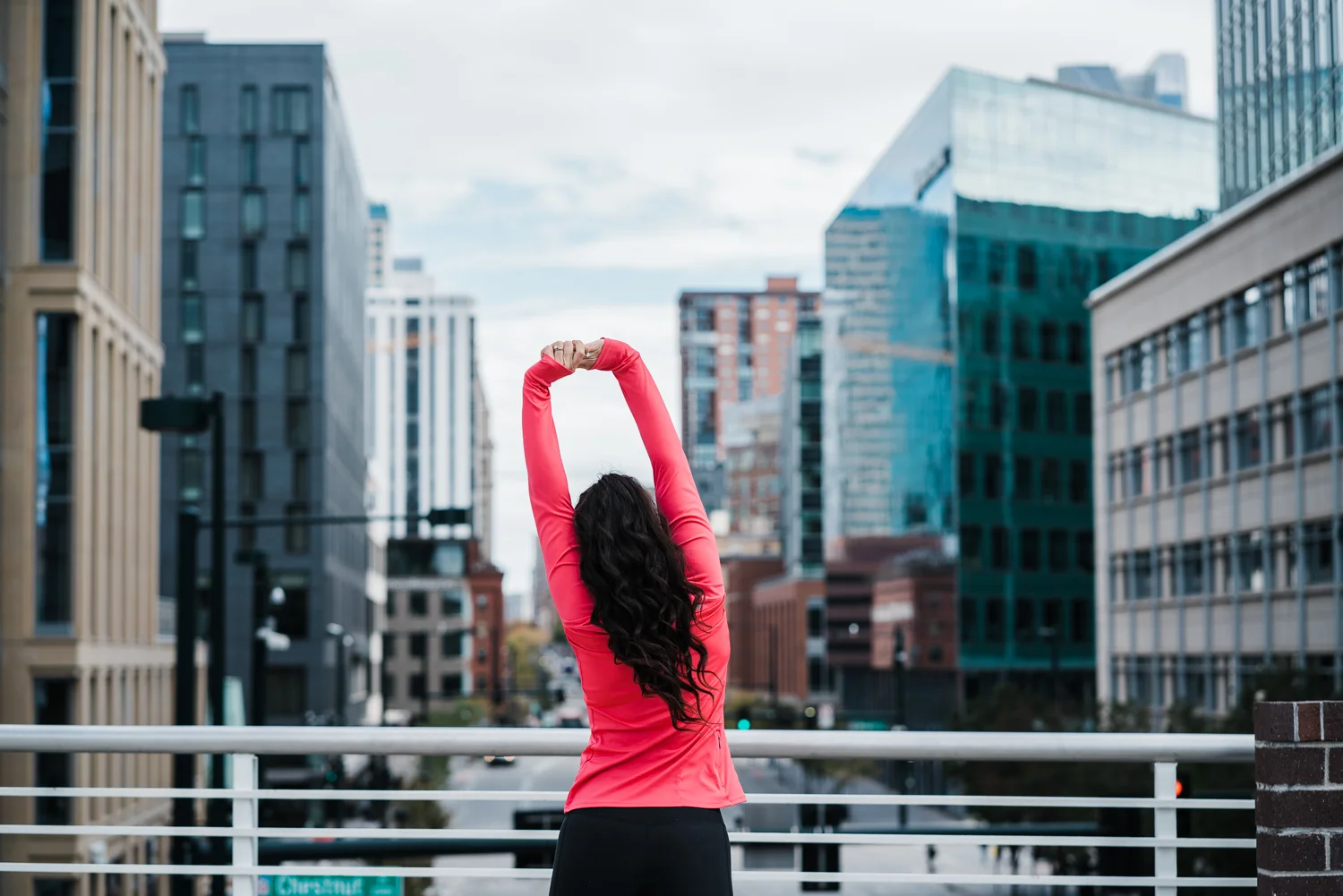 Girl-Stretching-Downtown-Denver.jpg
