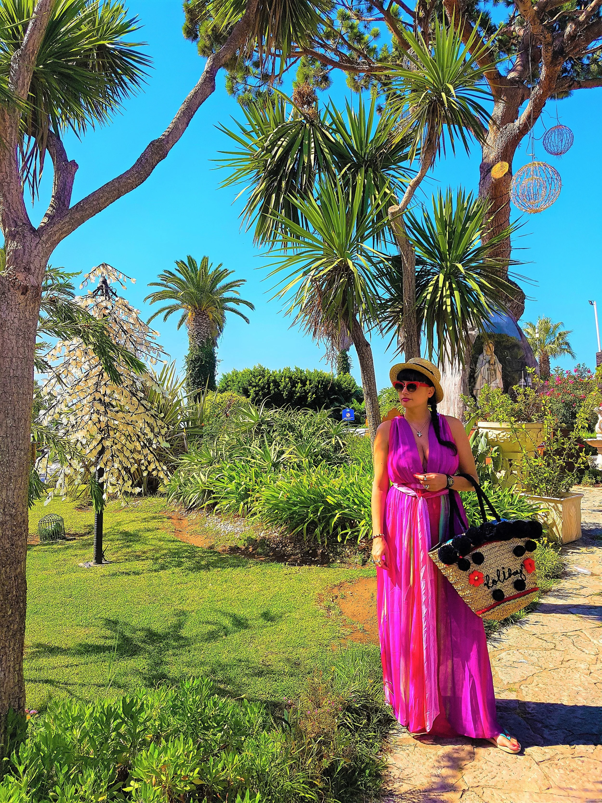 Holidays in Algarve, Portugal - Albufeira on a pink dress