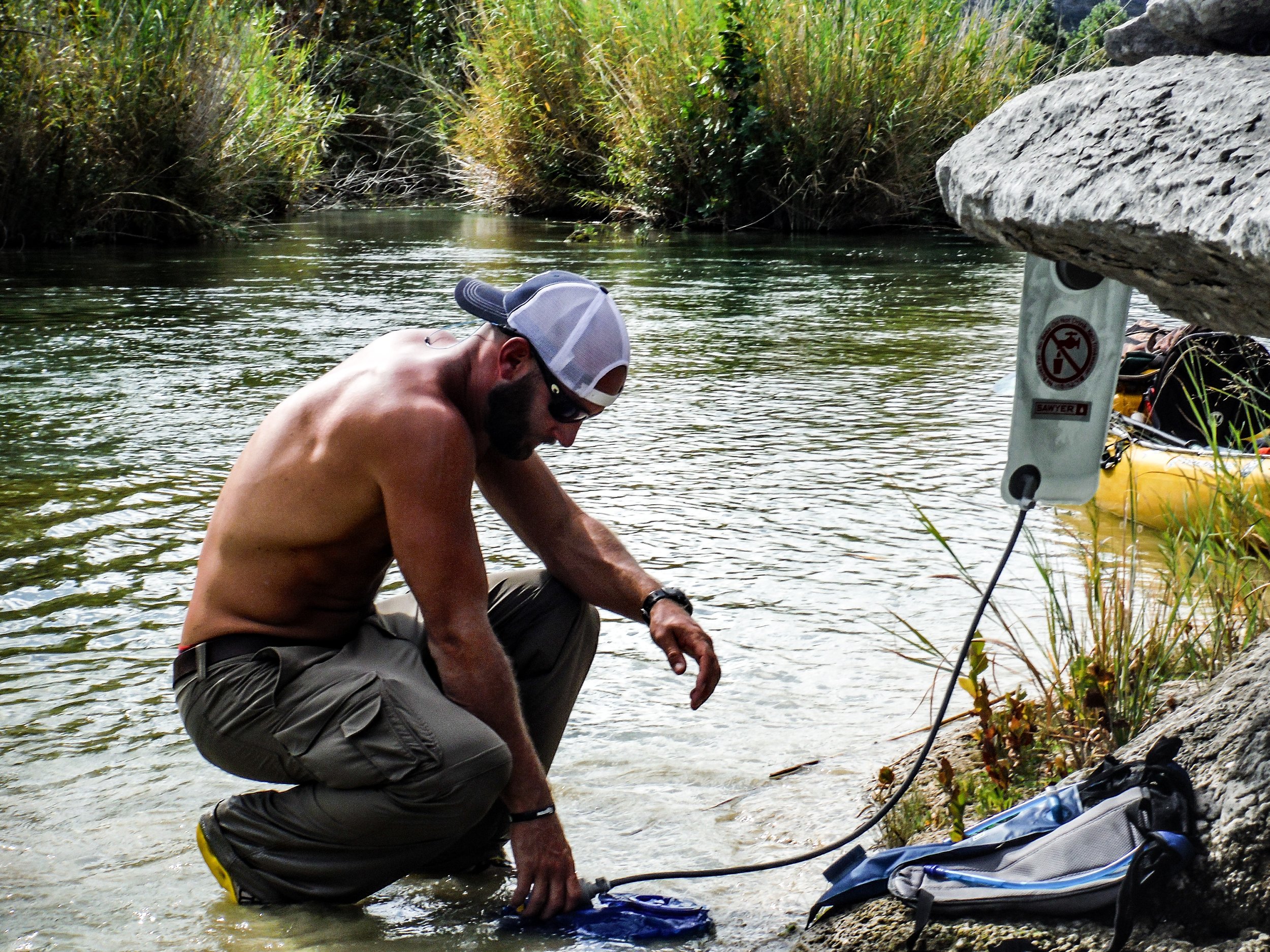 Mike Filtering water through a gravity style filter 