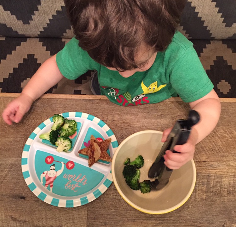 "You may go ahead and serve yourself" allowed me to continue getting dinner ready and even though the tongs were very intimidating at first, after a little encouragement of "You don't have to do it perfectly but you do have to try!", this guy learned a new fine motor skill!