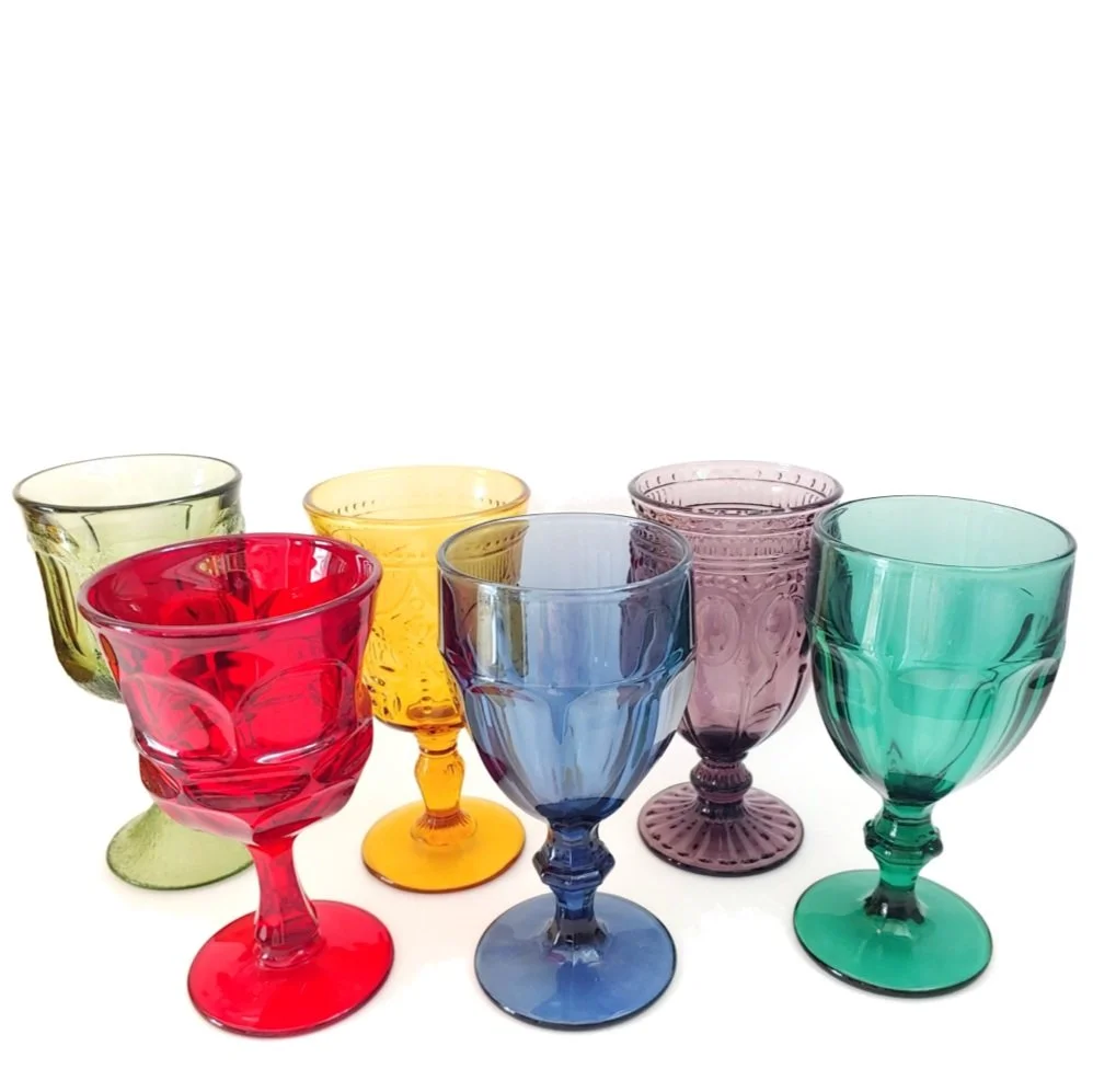 Mismatched vintage stained glass goblet collection for rent from Delicate  Dishes  Delicate Dishes LLC