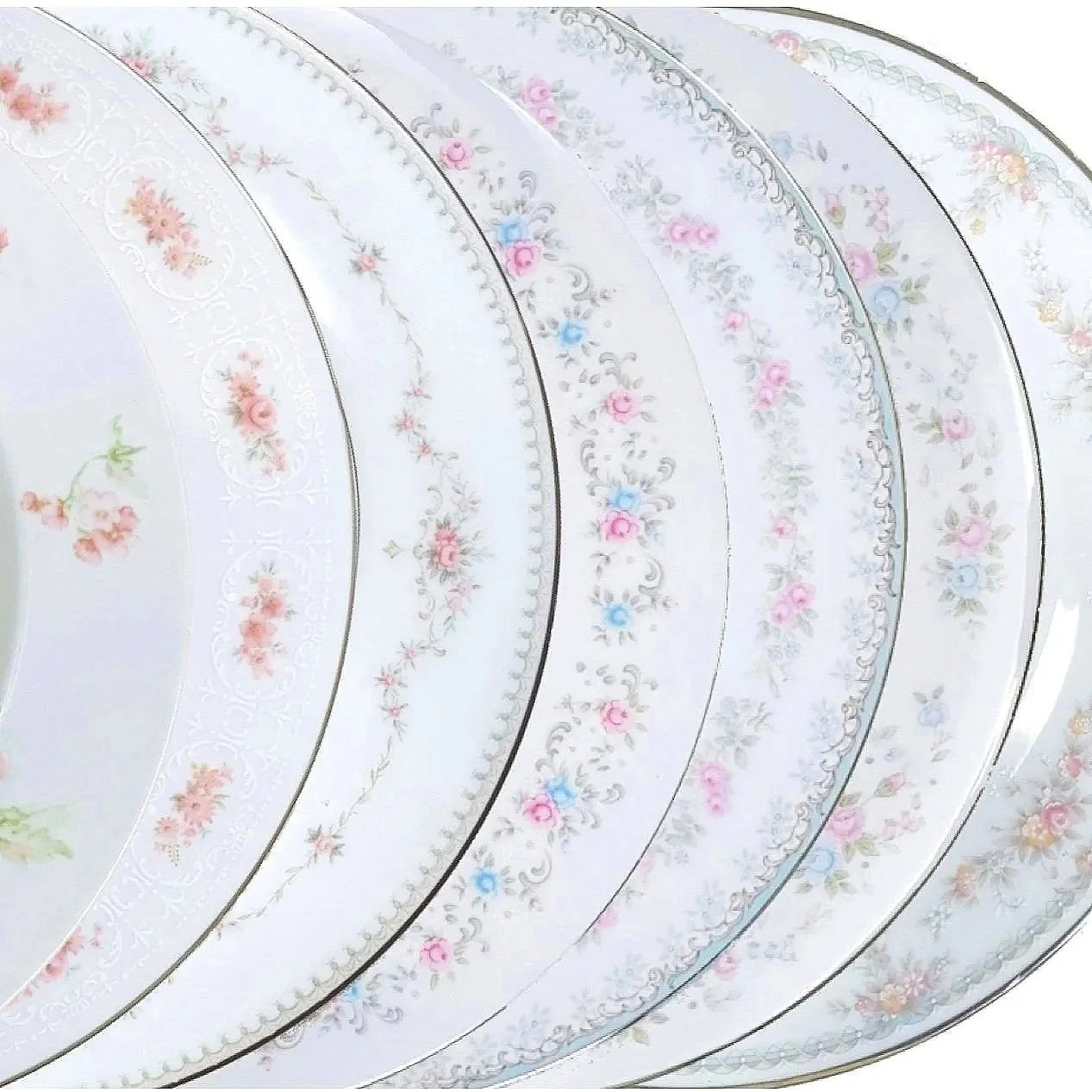 Beautiful vintage mismatched Bridal Pink Plate Collection for rent from Delicate Dishes LLC
