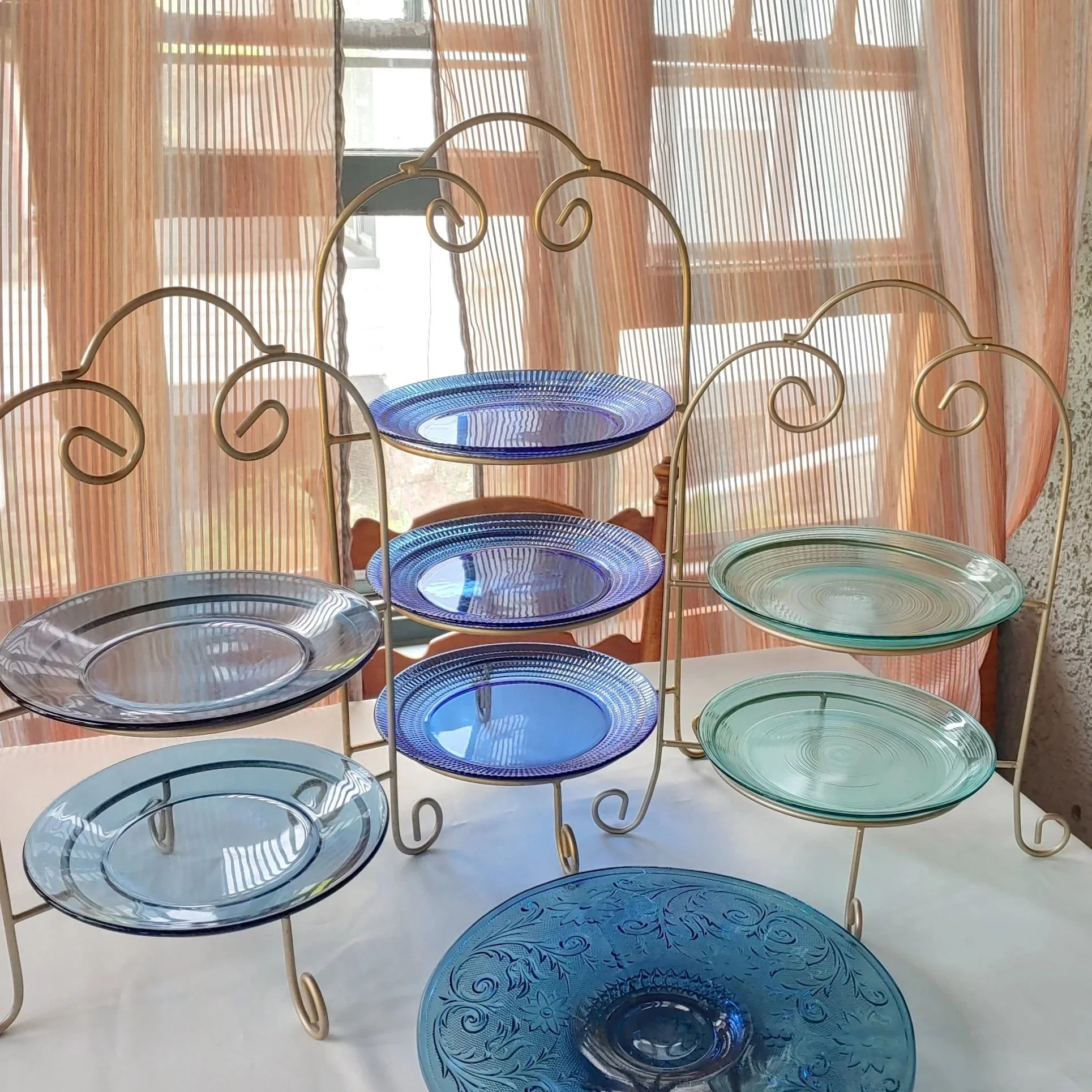 Vintage mismatched colored glass dishes & plates for rent from Delicate Dishes LLC