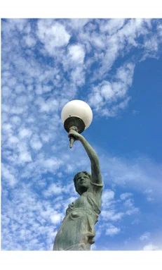 StatueLightCloudsTN.jpg