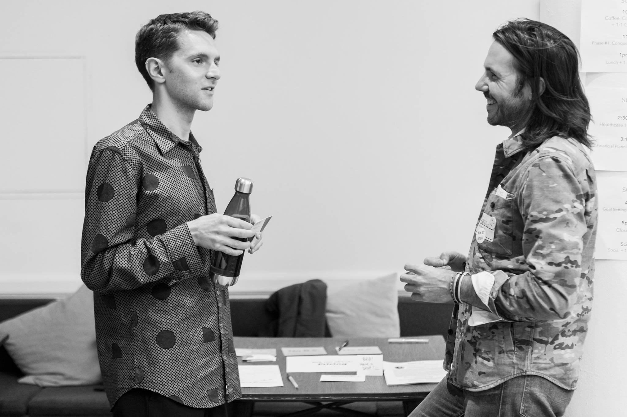 Dennis Laughing in Client Conversation.jpg