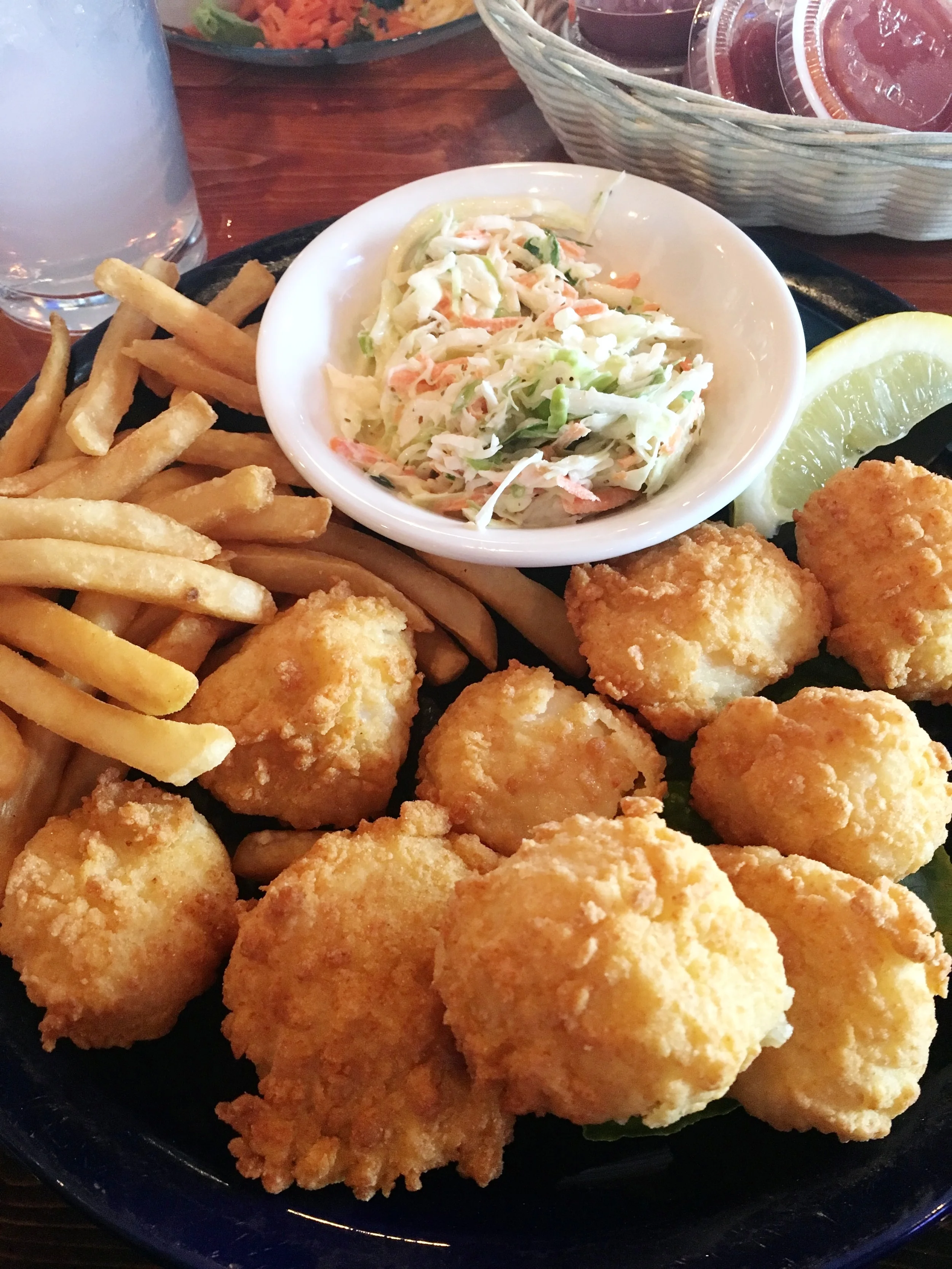 My fried sea scallops, coleslaw, and french fries. The price was around $24. 