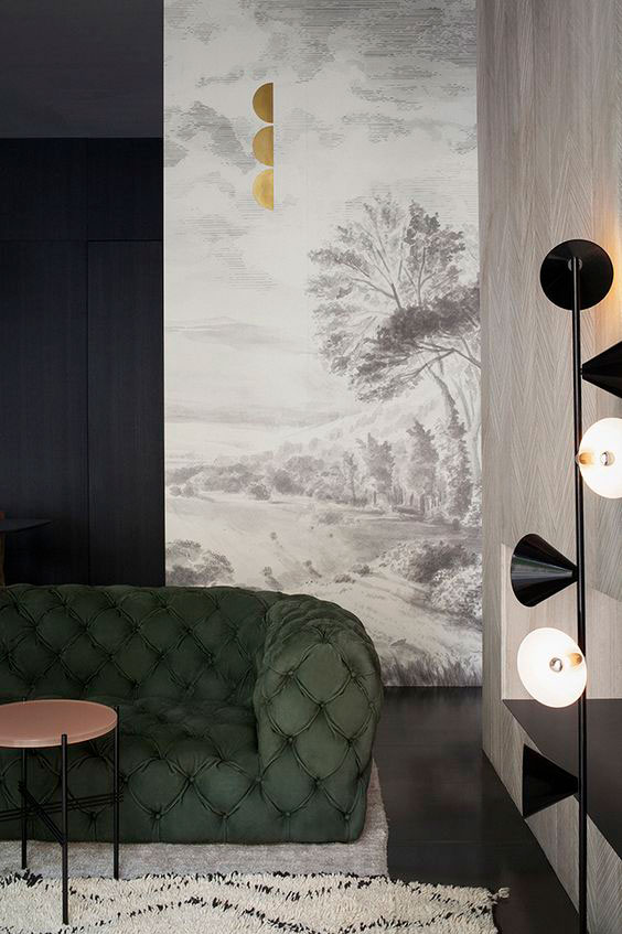 I'd long been inspired by this image from the Italian design duo Studiopepe via The Design Chaser blog. I love the traditional mural with the modern fixtures and pops of black. You can see the empty room here and that the color of the cabinets is very orangey.