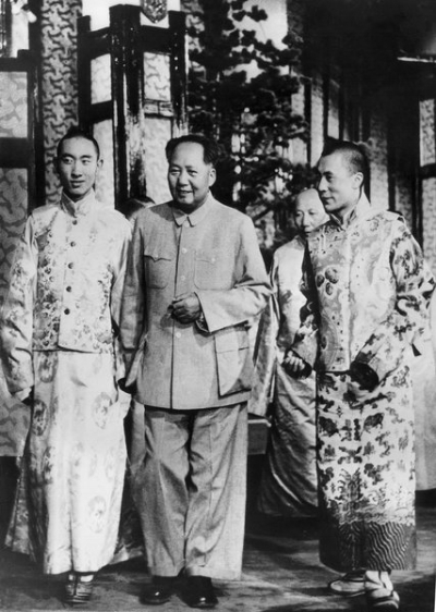 The Panchen Lama, left, the Dalai Lama aged 21, right, with Mao Zedong in 1956, the year a failed rebellion broke out in Eastern Tibet.