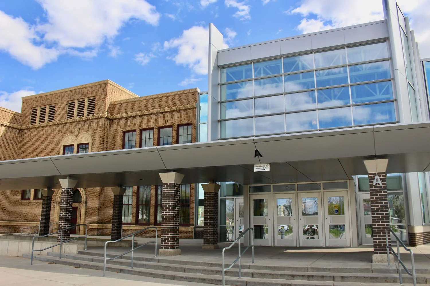 BEAUTIFUL BURTON SCHOOL DESIGNED BY HENRY H. TURNER WITH A NEW MODERN ADDITION THAT IS COMPLEMENTARY TO THE OLD BUILDING.
