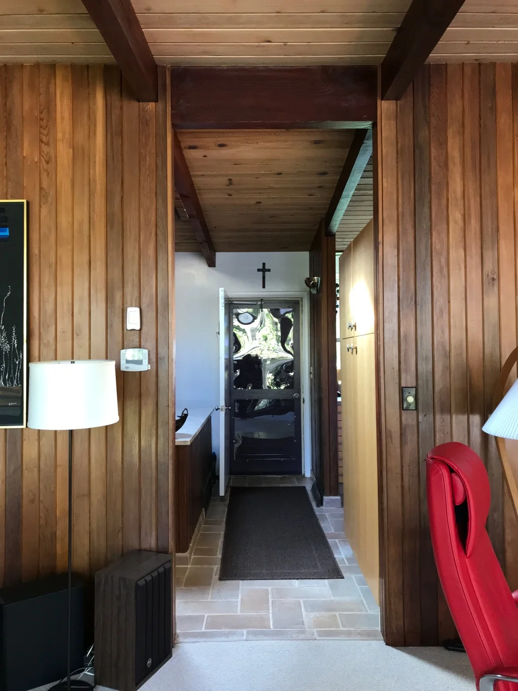 EXIT TO HALLWAY, STAIRS AND CARPORT