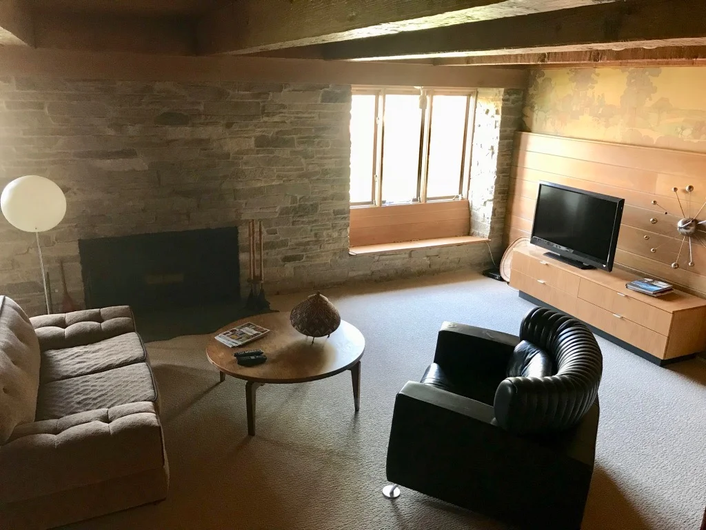 FAMILY ROOM WITH MURAL WALLPAPER