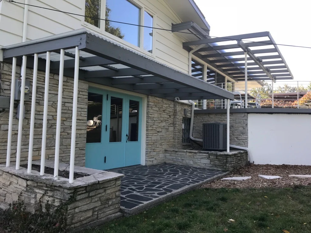 DOORS FROM LOWER LEVEL TO BACKYARD