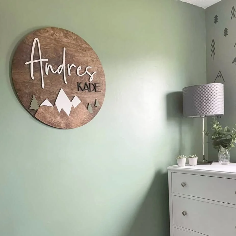 Although we are closed right now to custom orders we couldn't help bit show this beauty today! 

Our circle name signs make a beautiful addition to any space. We love this nursery and how in the clients words this piece &quot;completed the room&quot;