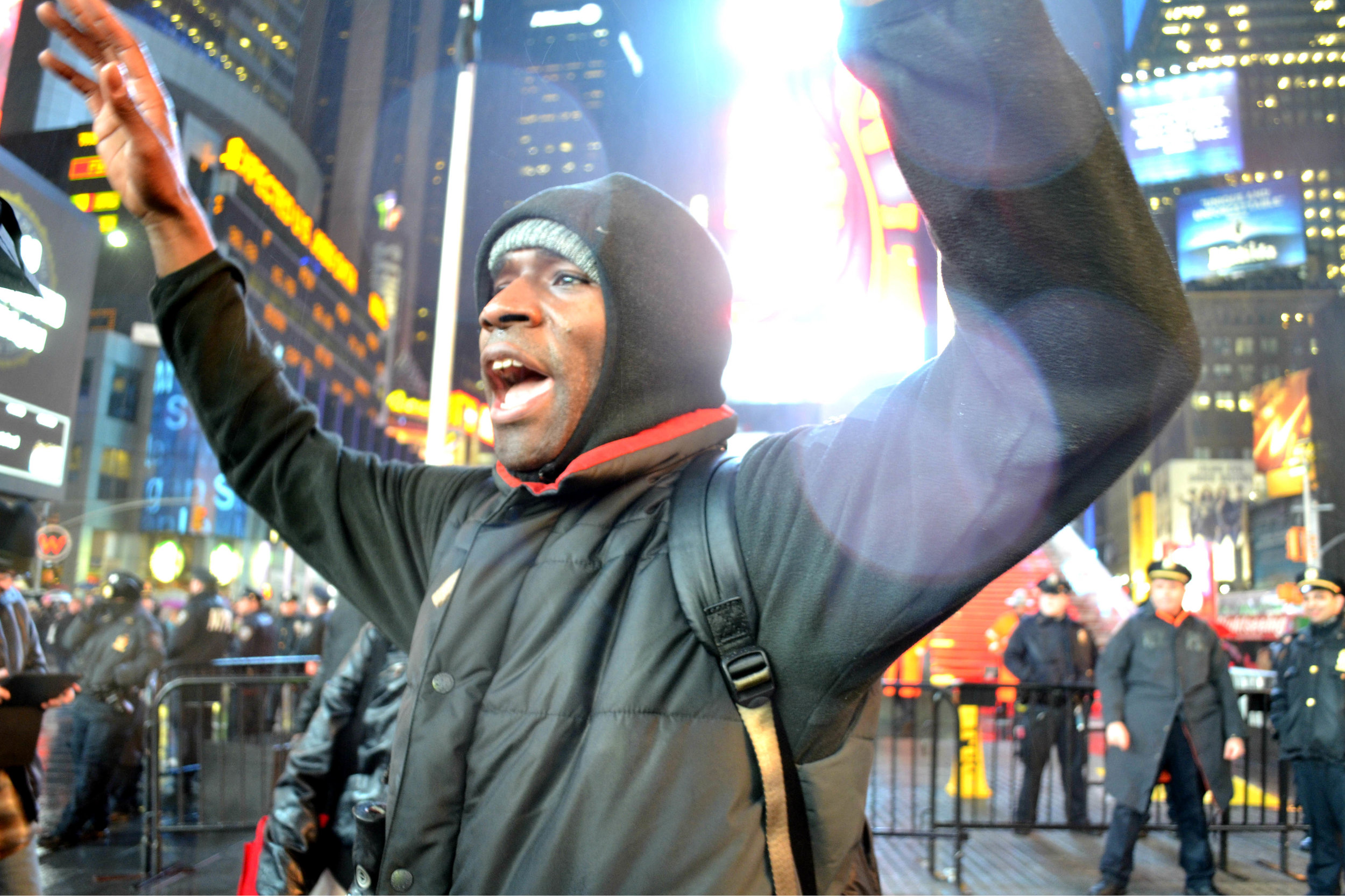  A protester chants in Times Square on Dec. 5, 2014, the third night of protests after the grand jury decision on Eric Garner's death. 