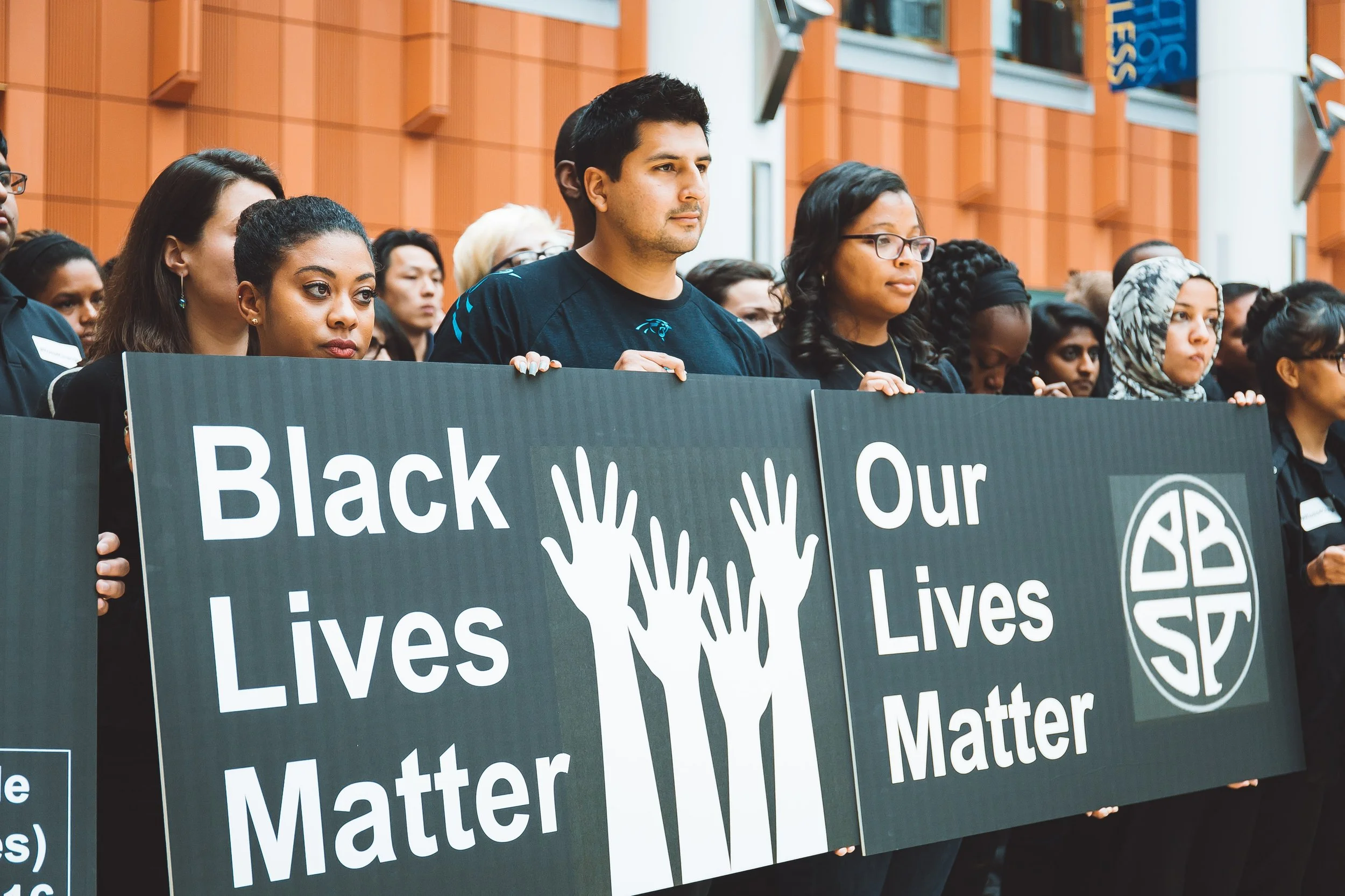 Hundreds of students gather in the Winter Garden of the Ross School of Business to show their solidarity.