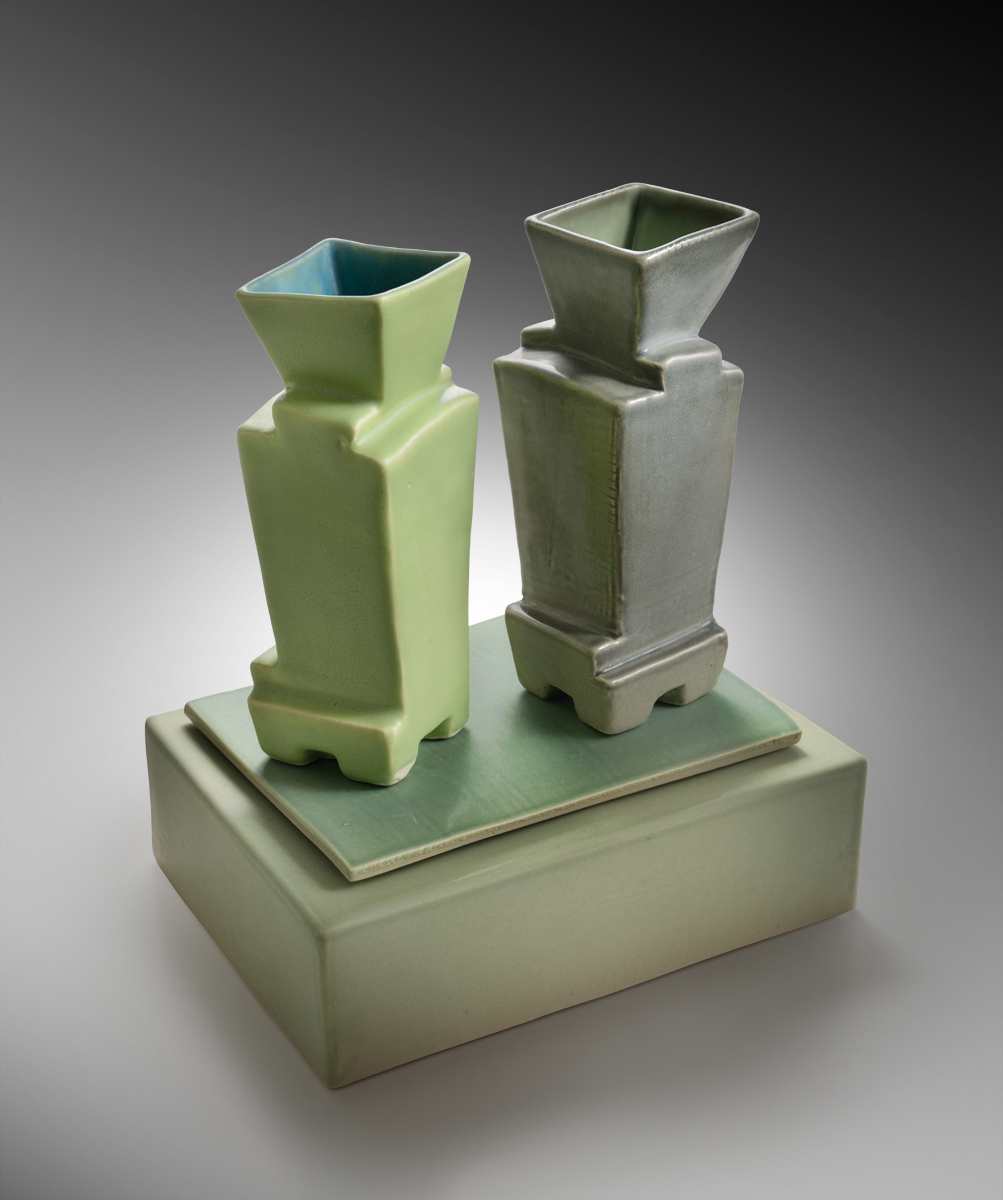 Two Vases On Green Vase