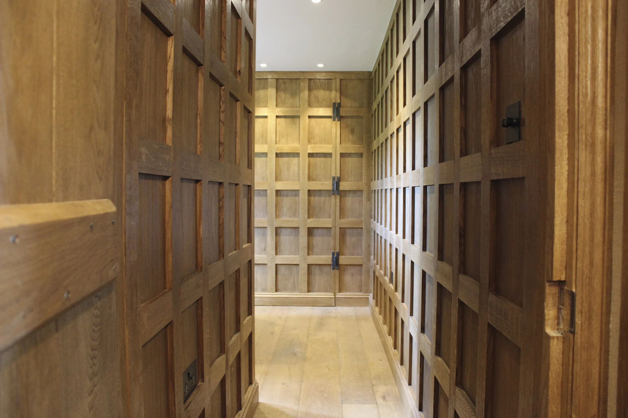 Full oak panelled walls in study area. Materials were carefully chosen to reflect the original style of the home.