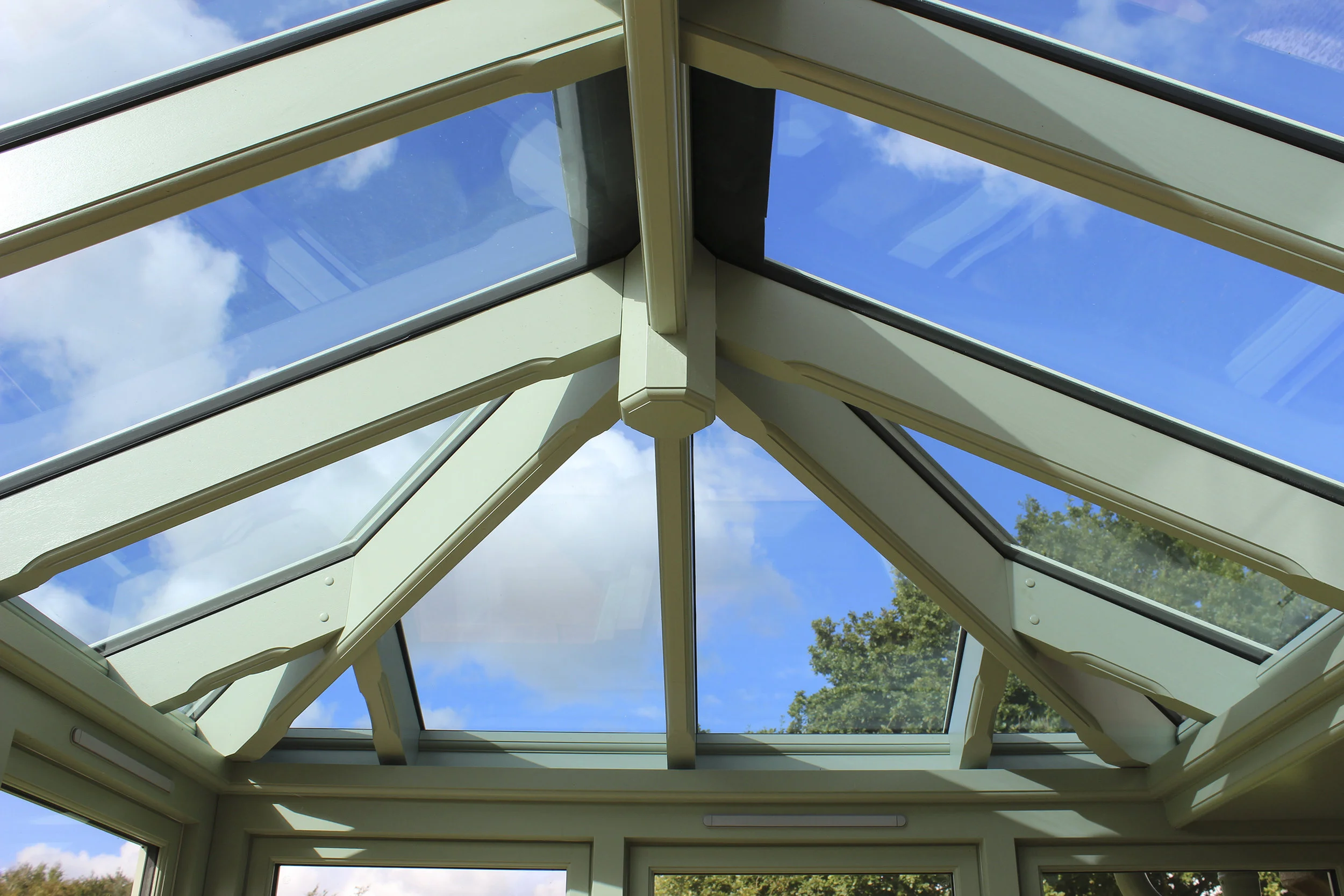 Hard wood conservatory painted to match all external woodwork of the property.
