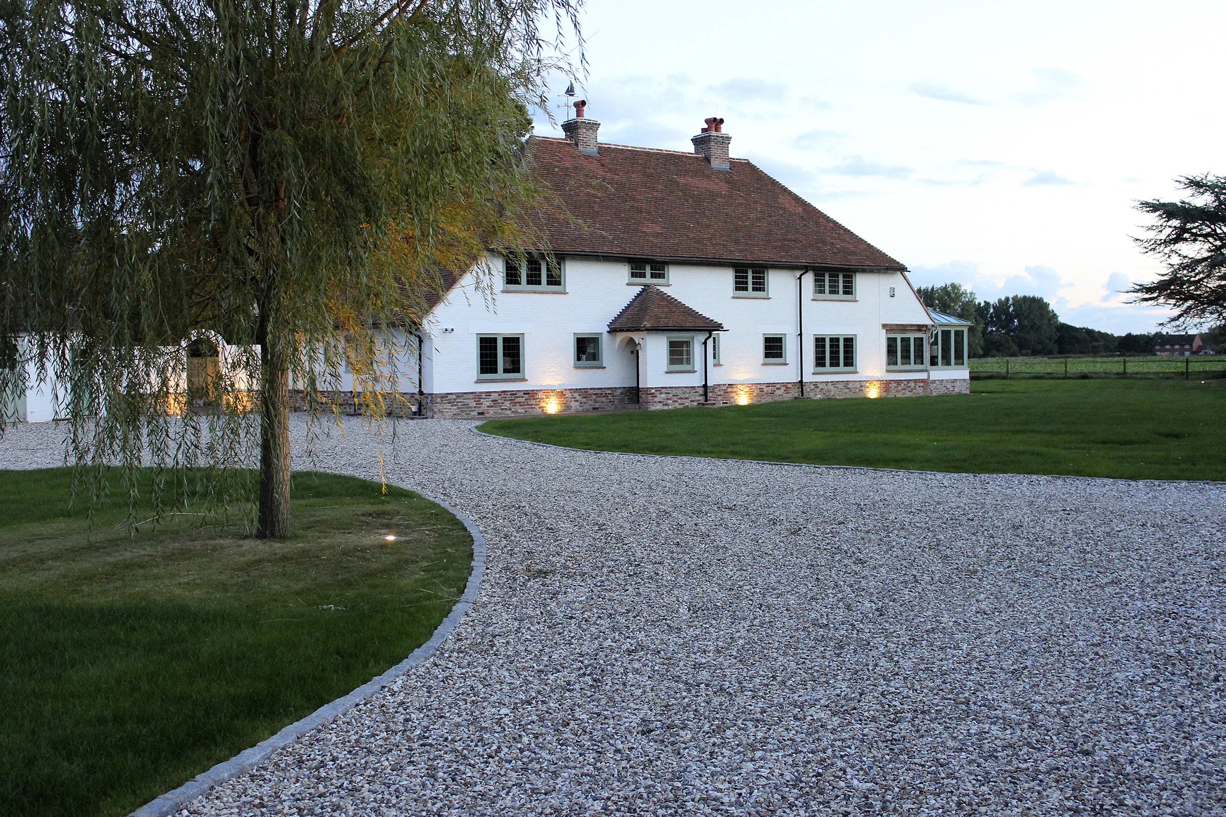 New lawn and reworked driveway adds to the aesthetics of the property.