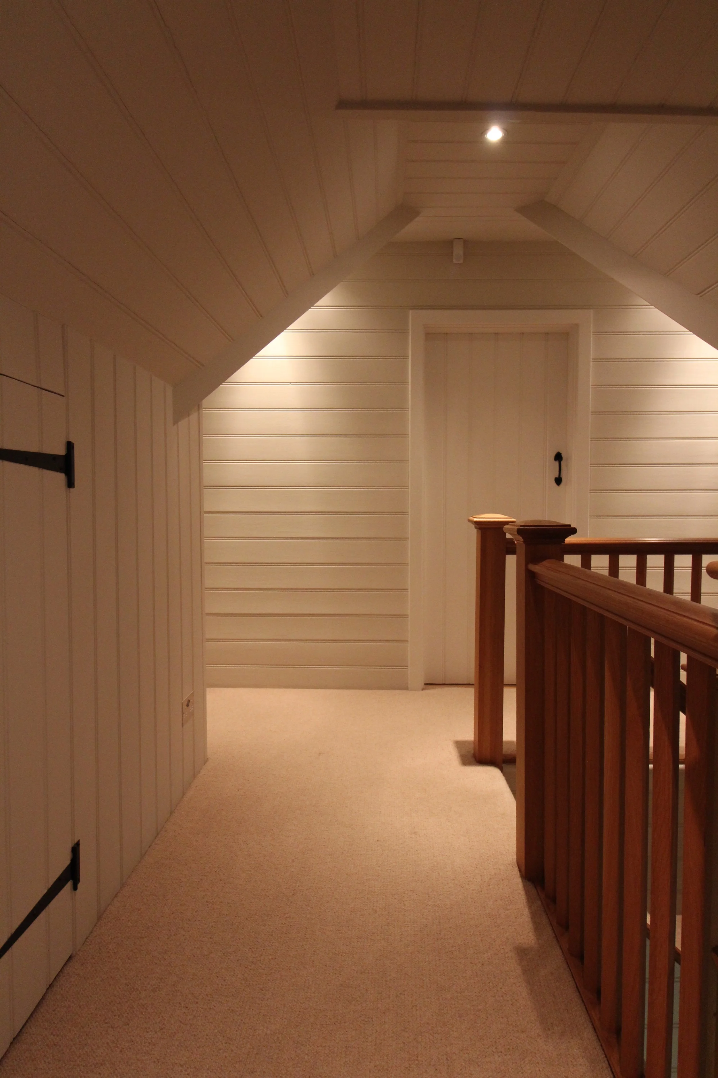 Tongue and groove wall panelling, carefully repaired and decorated in Farrow and Ball paint.