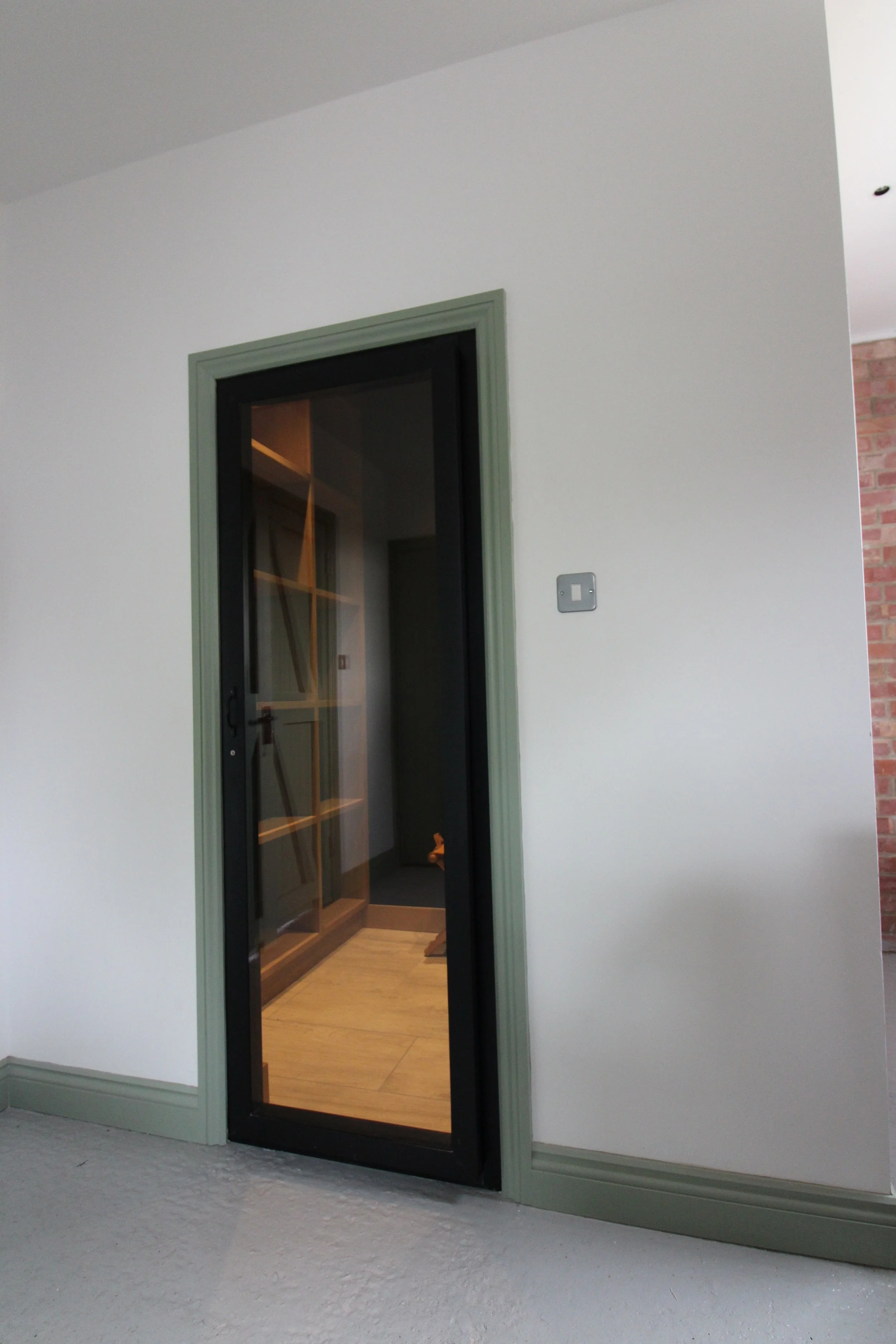 Insulated wine storage unit, designed to maintain exactly 55 degrees Fahrenheit.