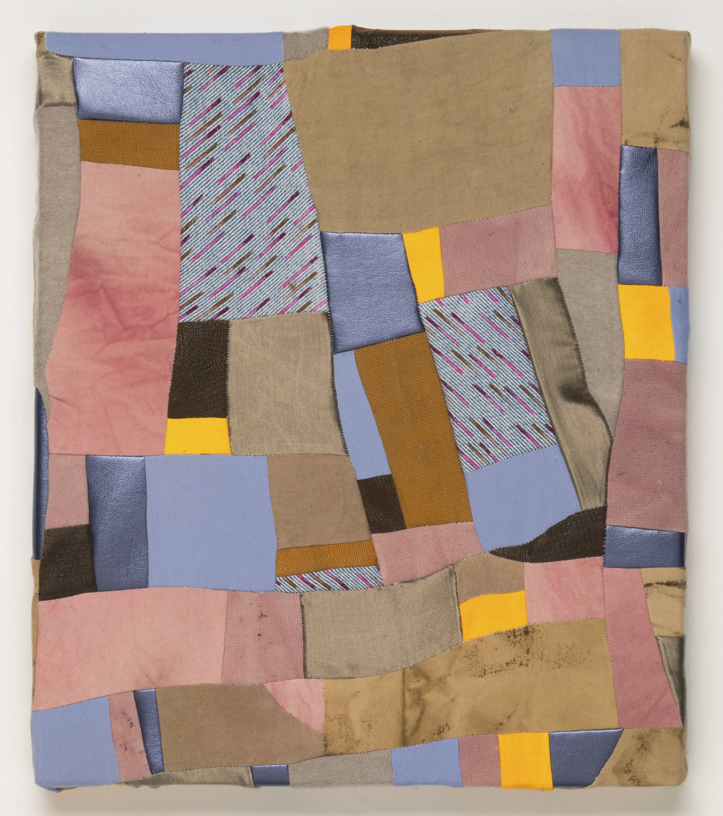 2017, Dust Puddle, Cotton fabric, canvas, coffee, madder, cochineal, dye, acrylic paint, faux leather, faux snakskin, 12" x 14"
