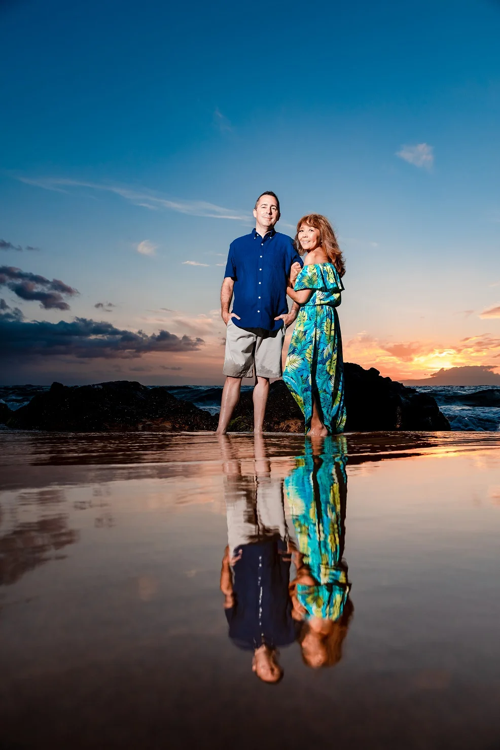 couples portrait reflection sunset