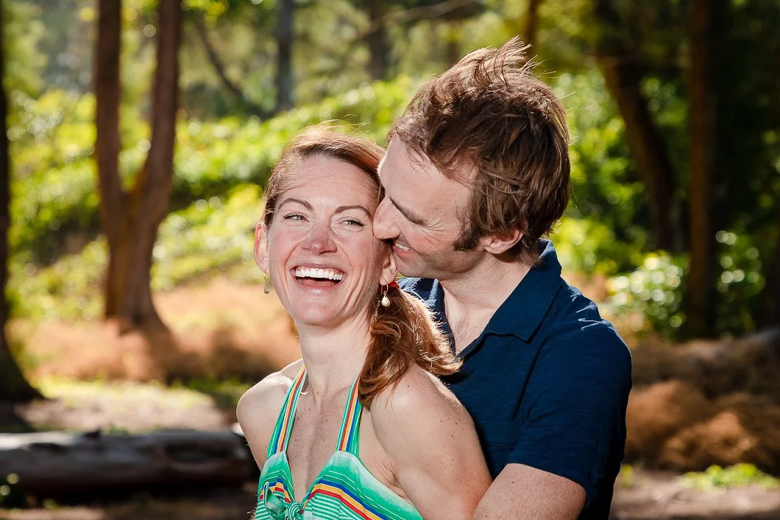 laughing couple coeur d'alene forest portrait