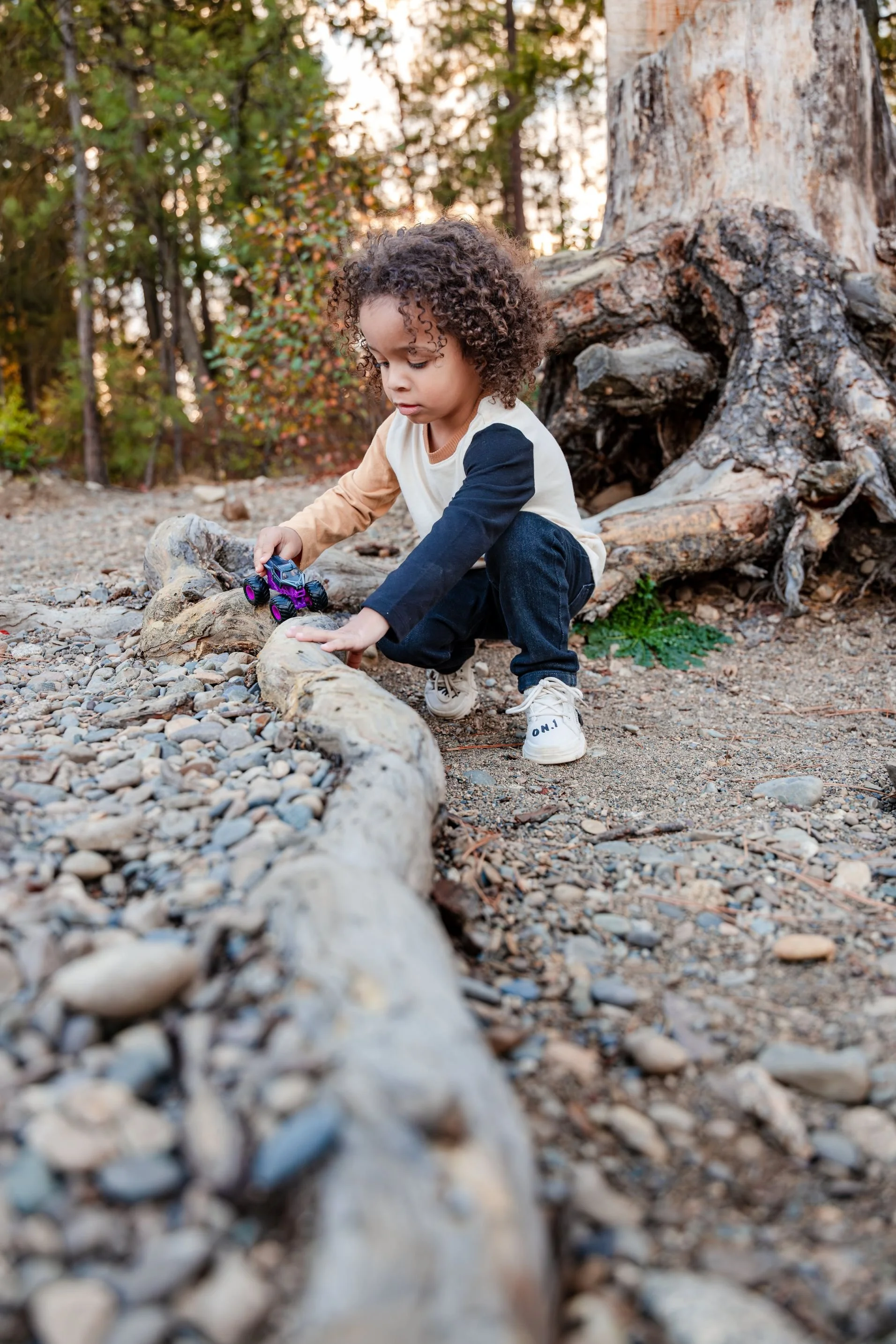 boy playing in corbin park coeur d'alene photographer