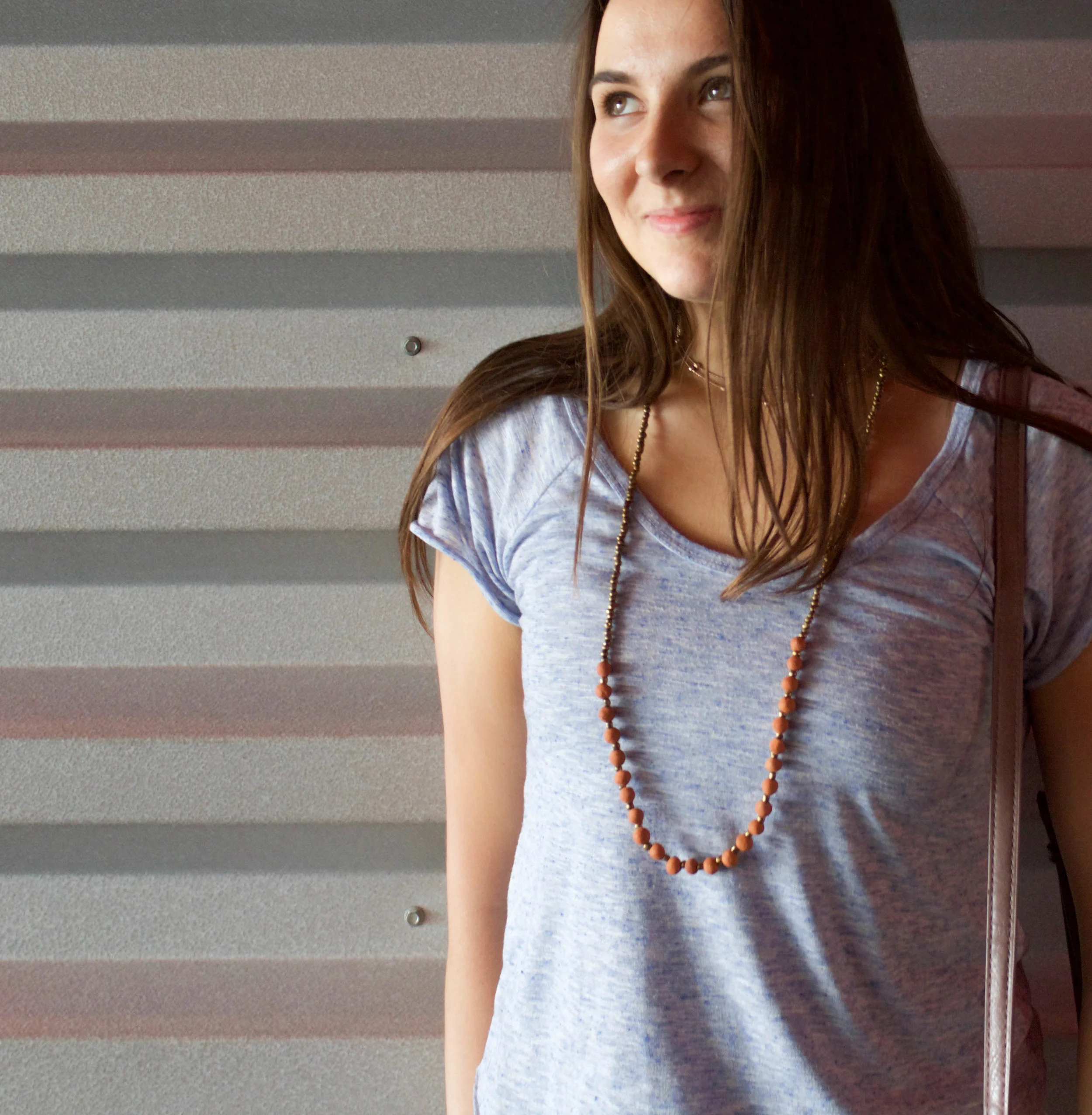 Aubrey rocking her souvenir necklace from HDC.